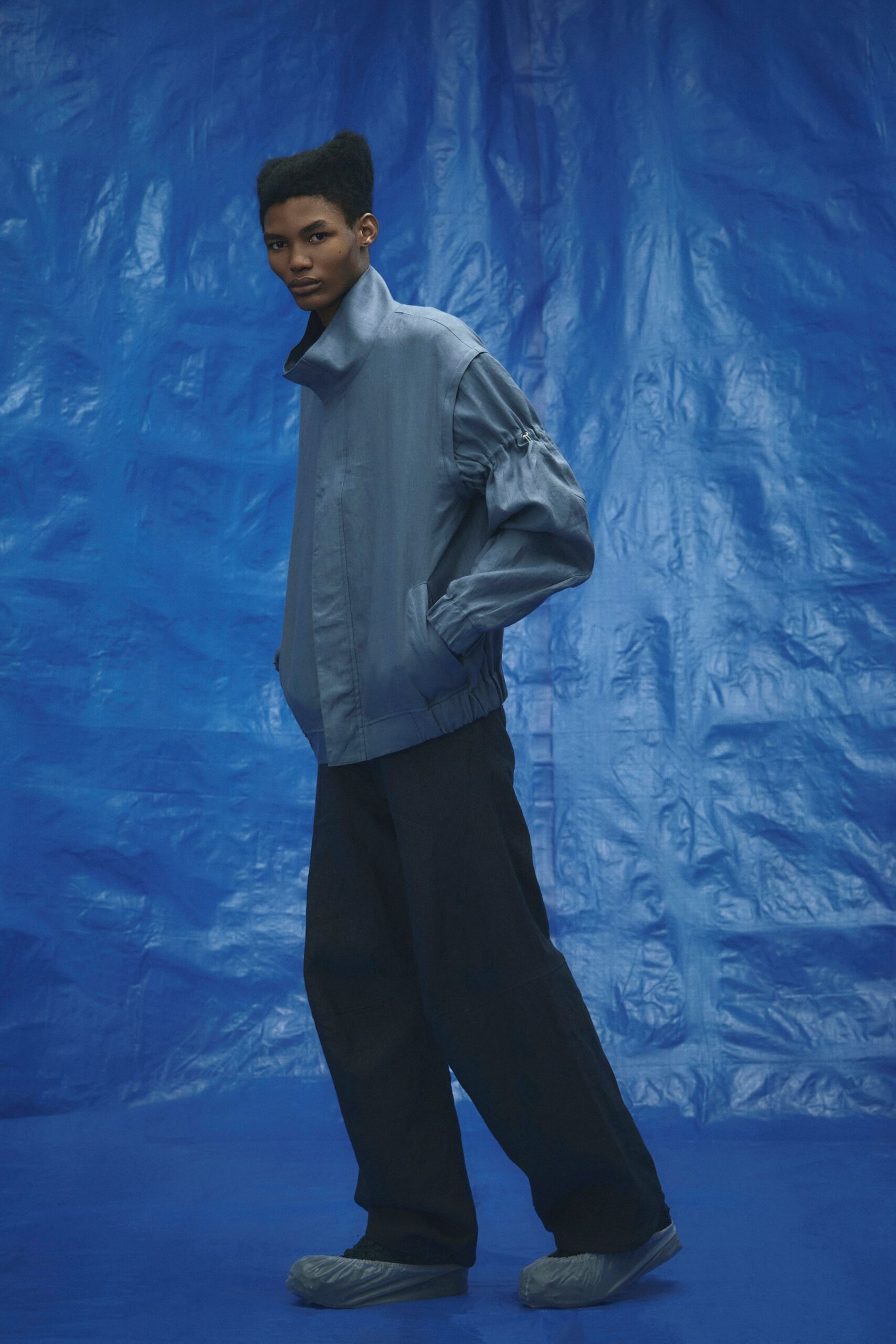 blue relaxed jacket with black pants