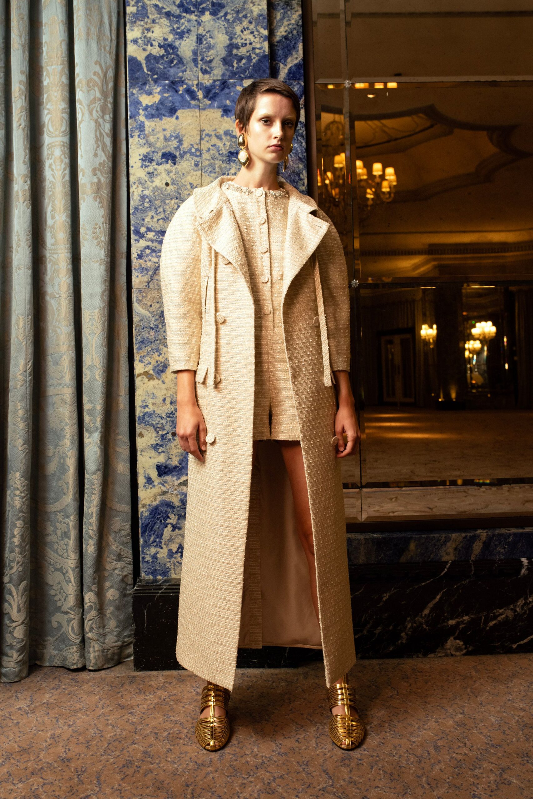 beige tweed coat and shorts