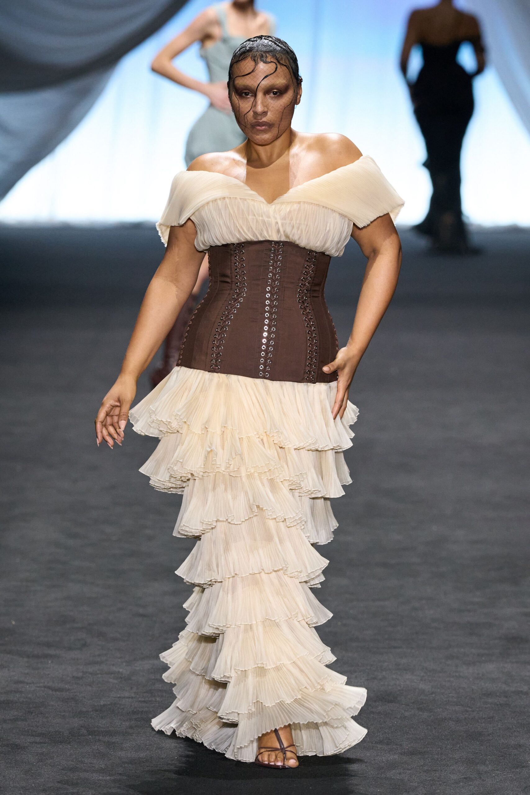 beige pleated off-shoulder gown