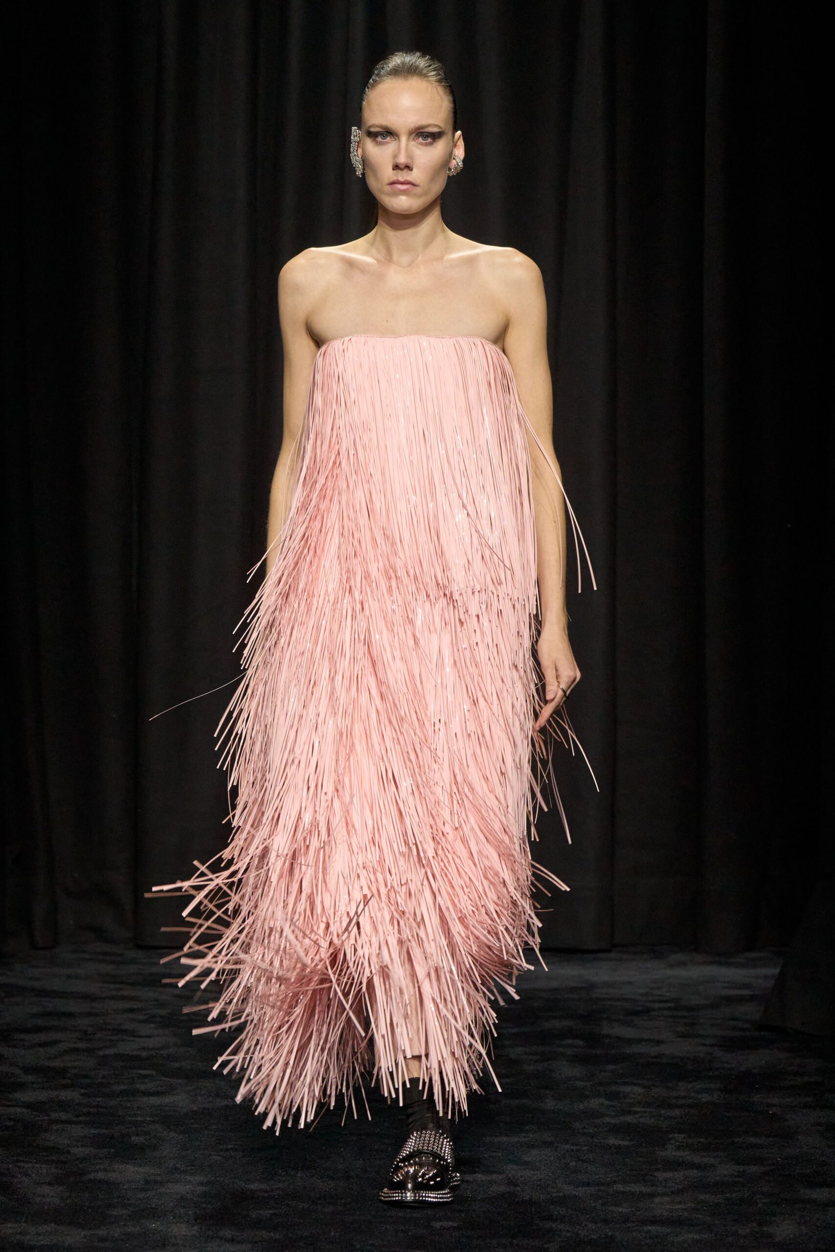 pink fringed midi dress with black shoes