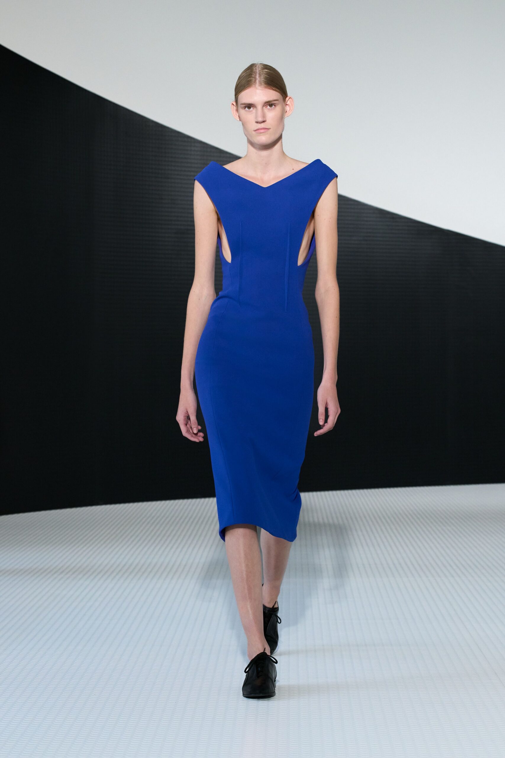 blue fitted midi dress with cutouts