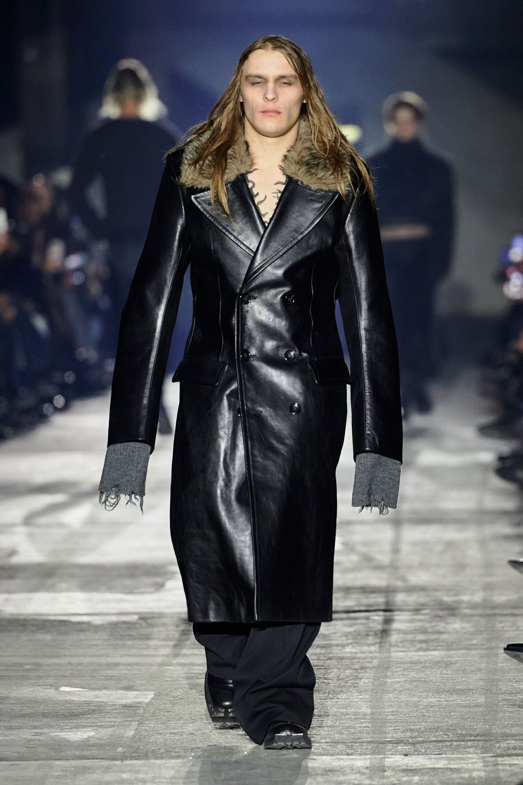black leather coat with relaxed pants