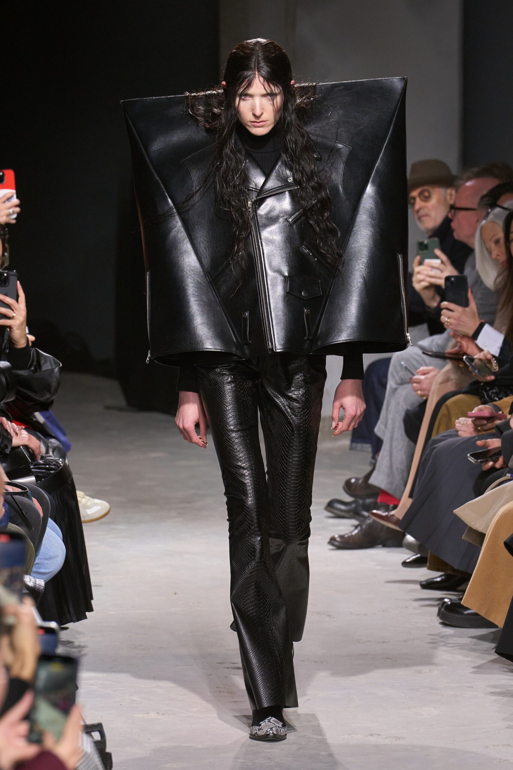 black leather structured jacket and fitted pants