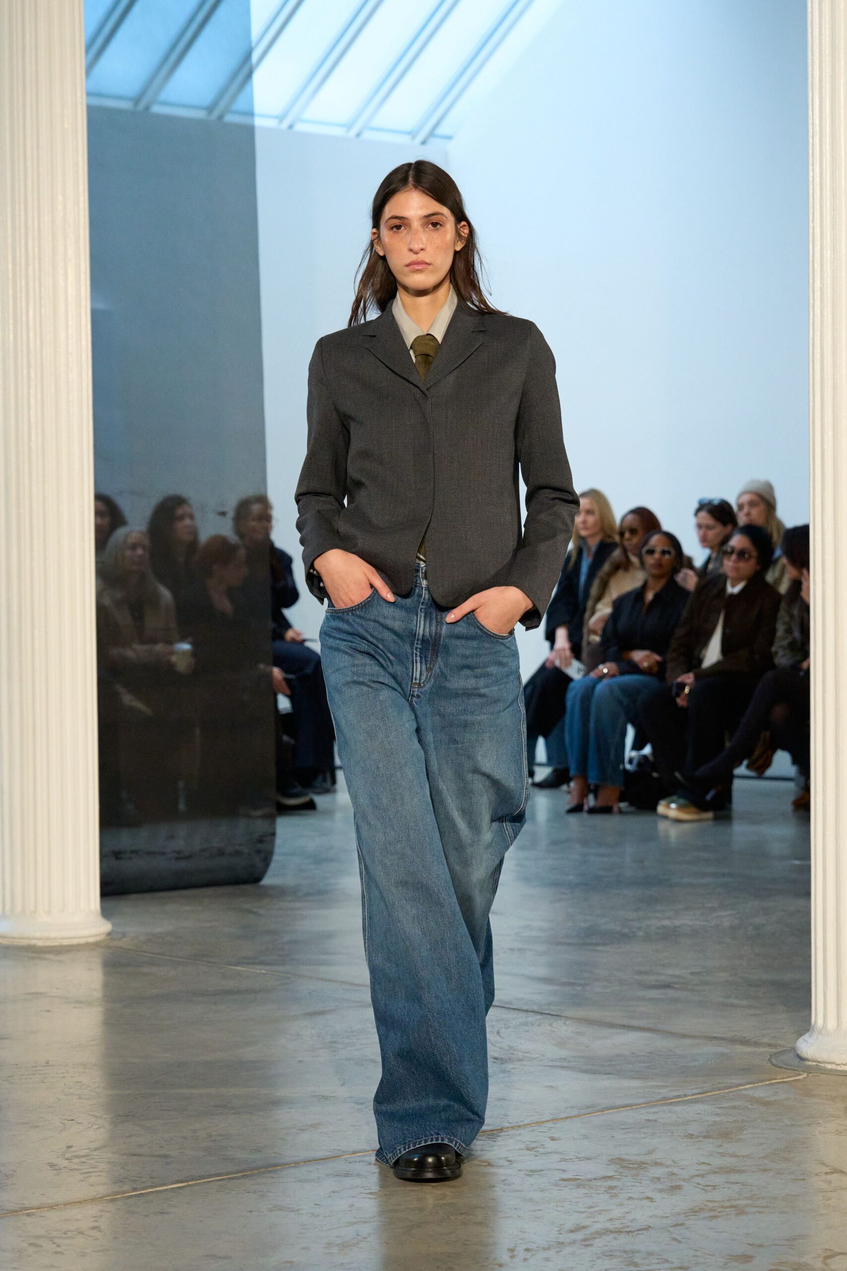 gray tailored blazer with relaxed denim pants
