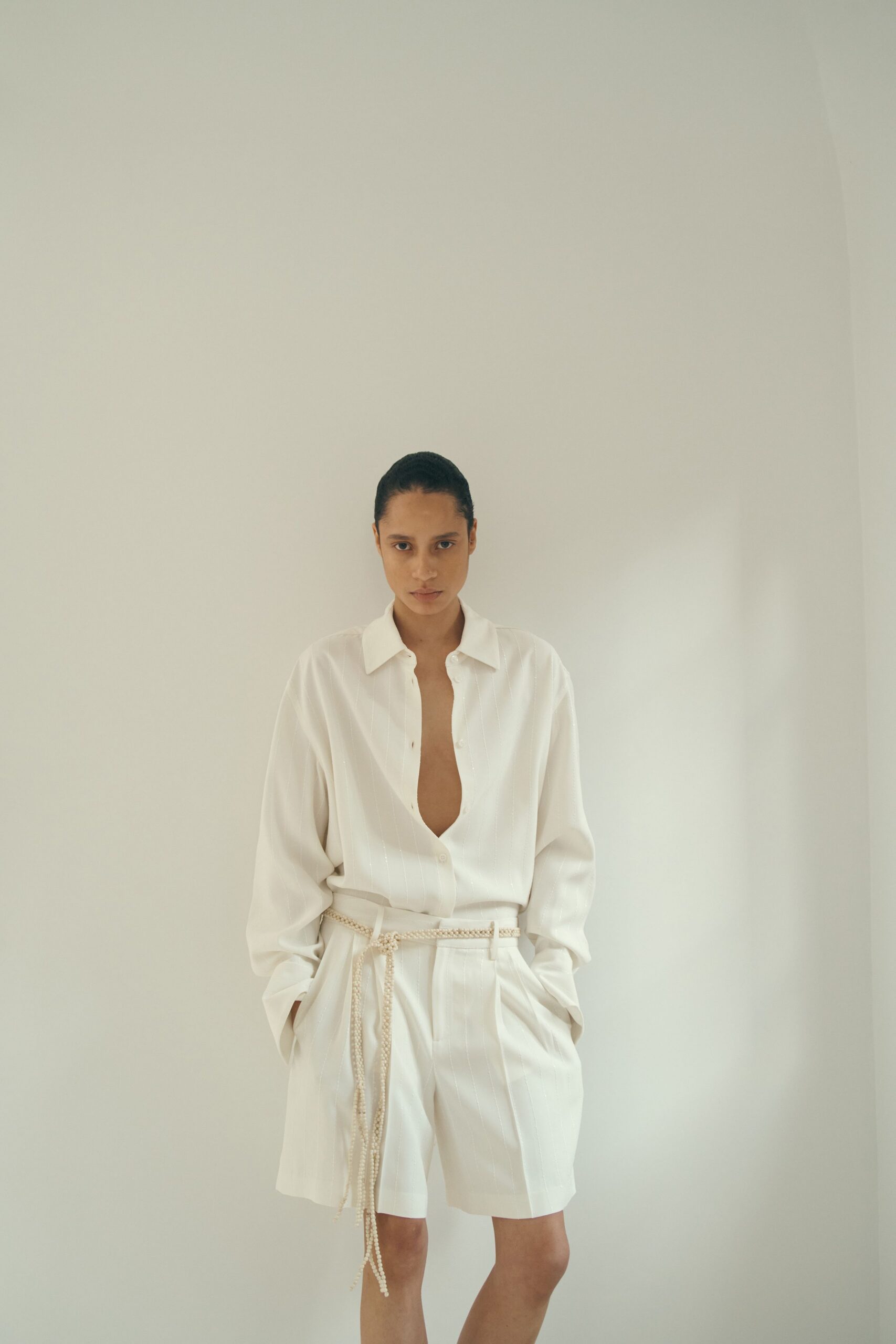 white relaxed shirt and shorts