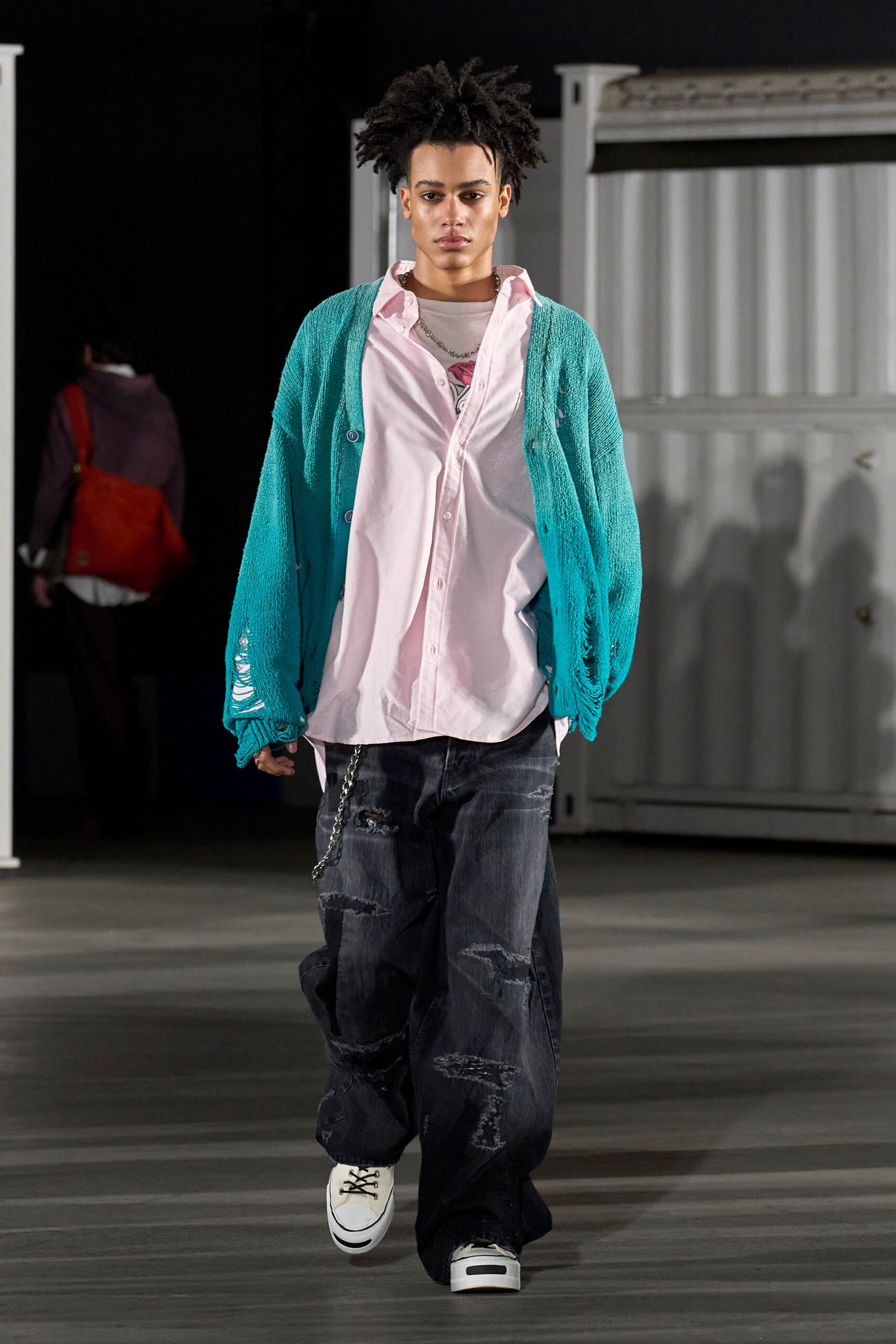 teal cardigan white shirt blue pants