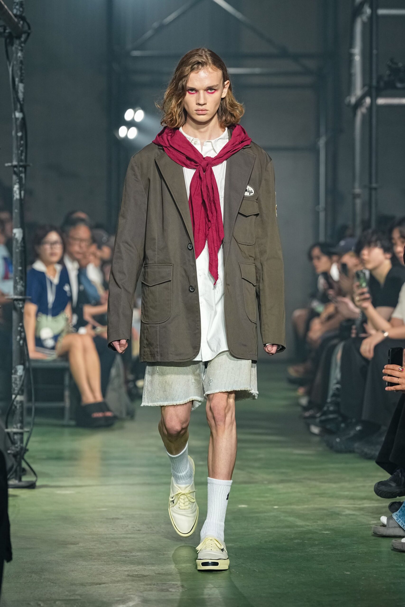 brown relaxed jacket with red scarf
