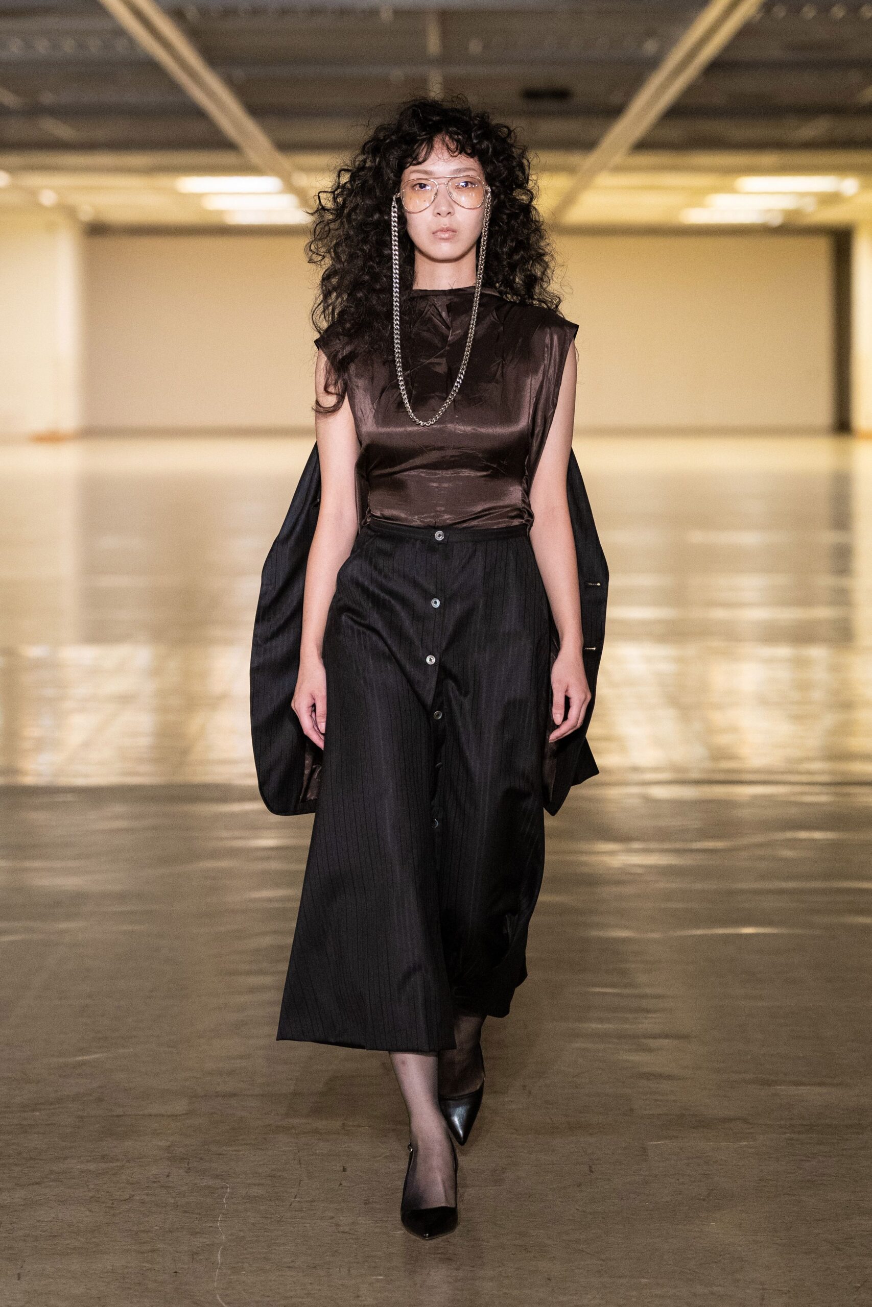 brown silk sleeveless high-neck fitted top