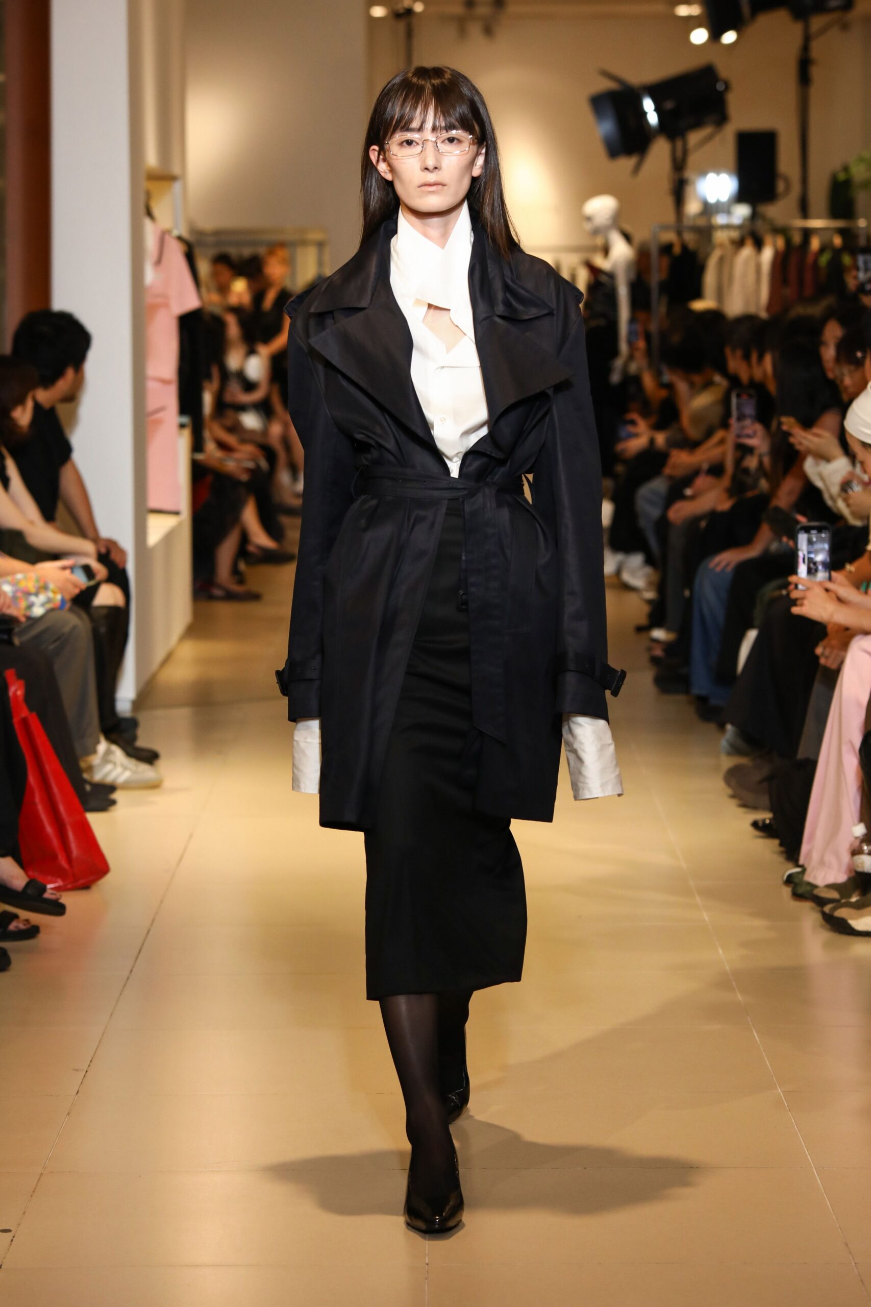 black cotton long-sleeve collared fitted belted trench
