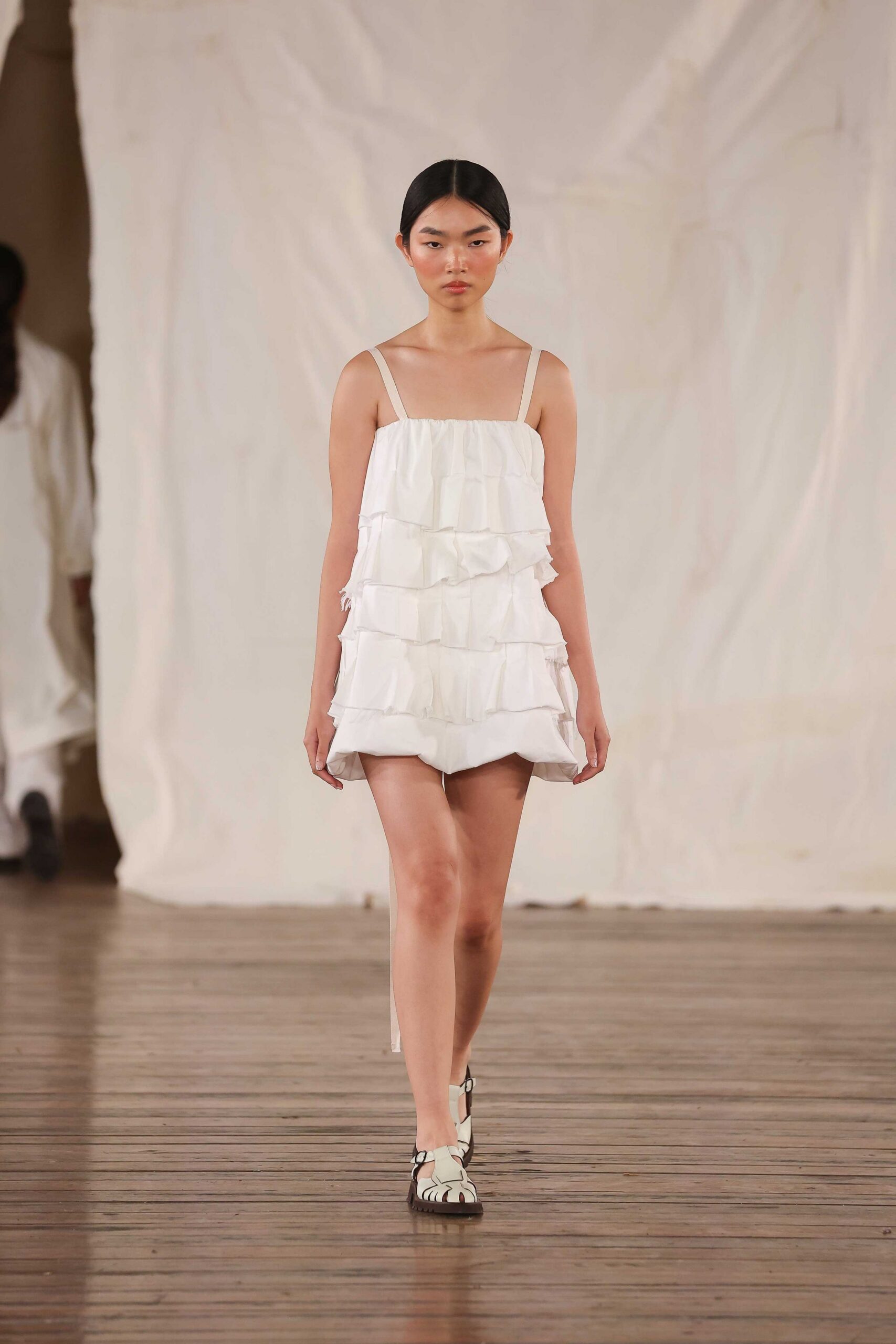 white ruffled short dress