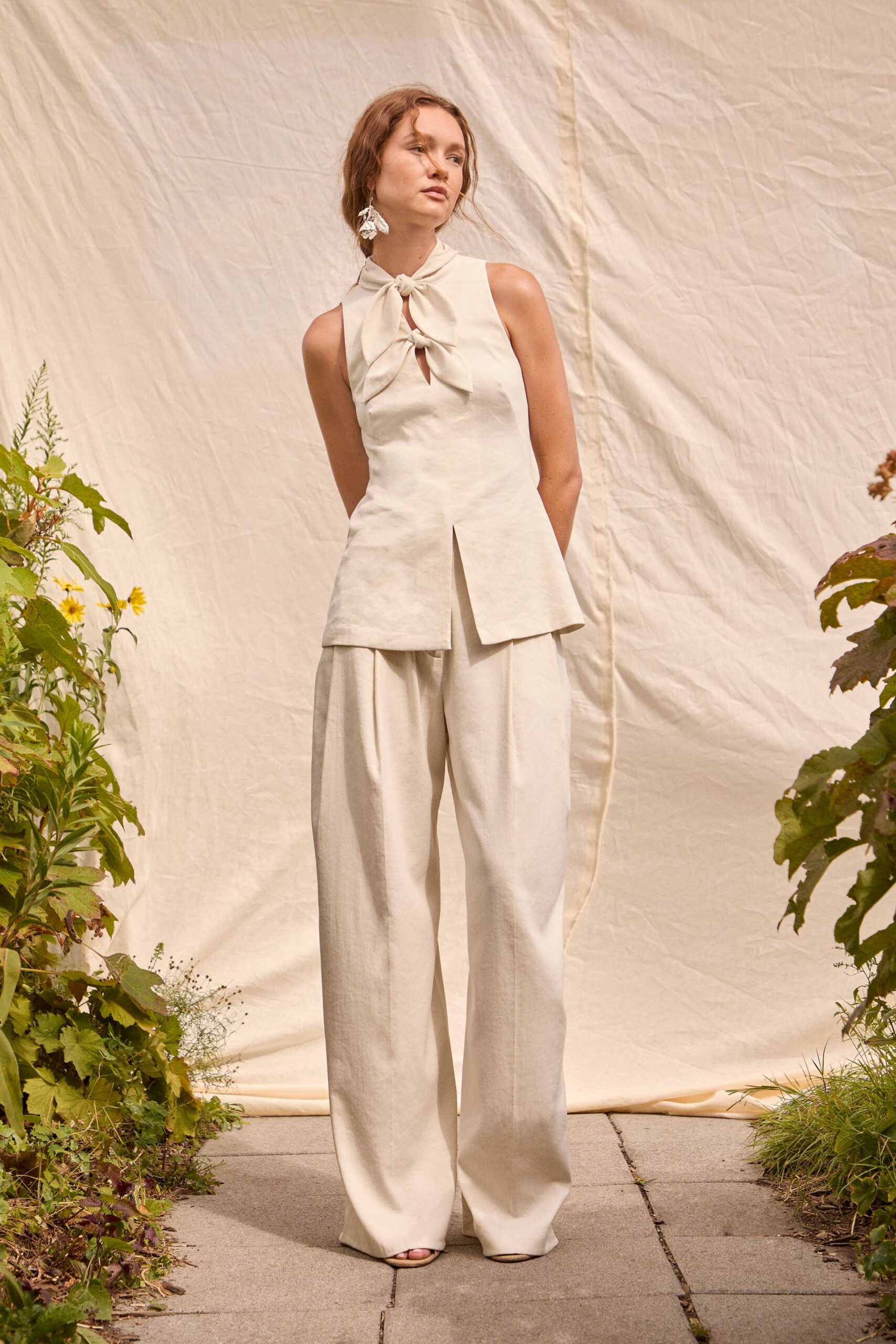 beige fitted top with wide-leg pants