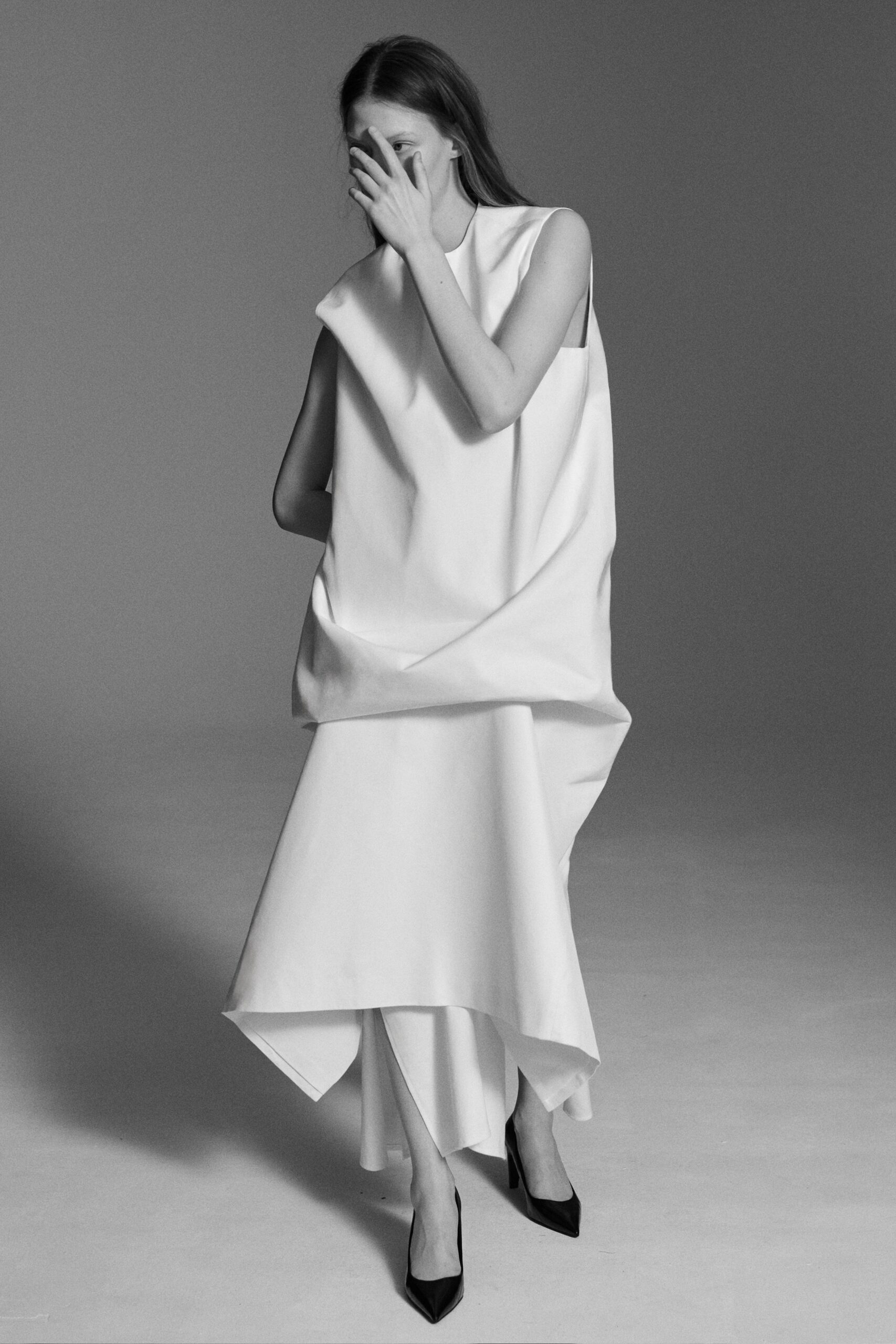 white cotton sleeveless high-neck relaxed midi dress