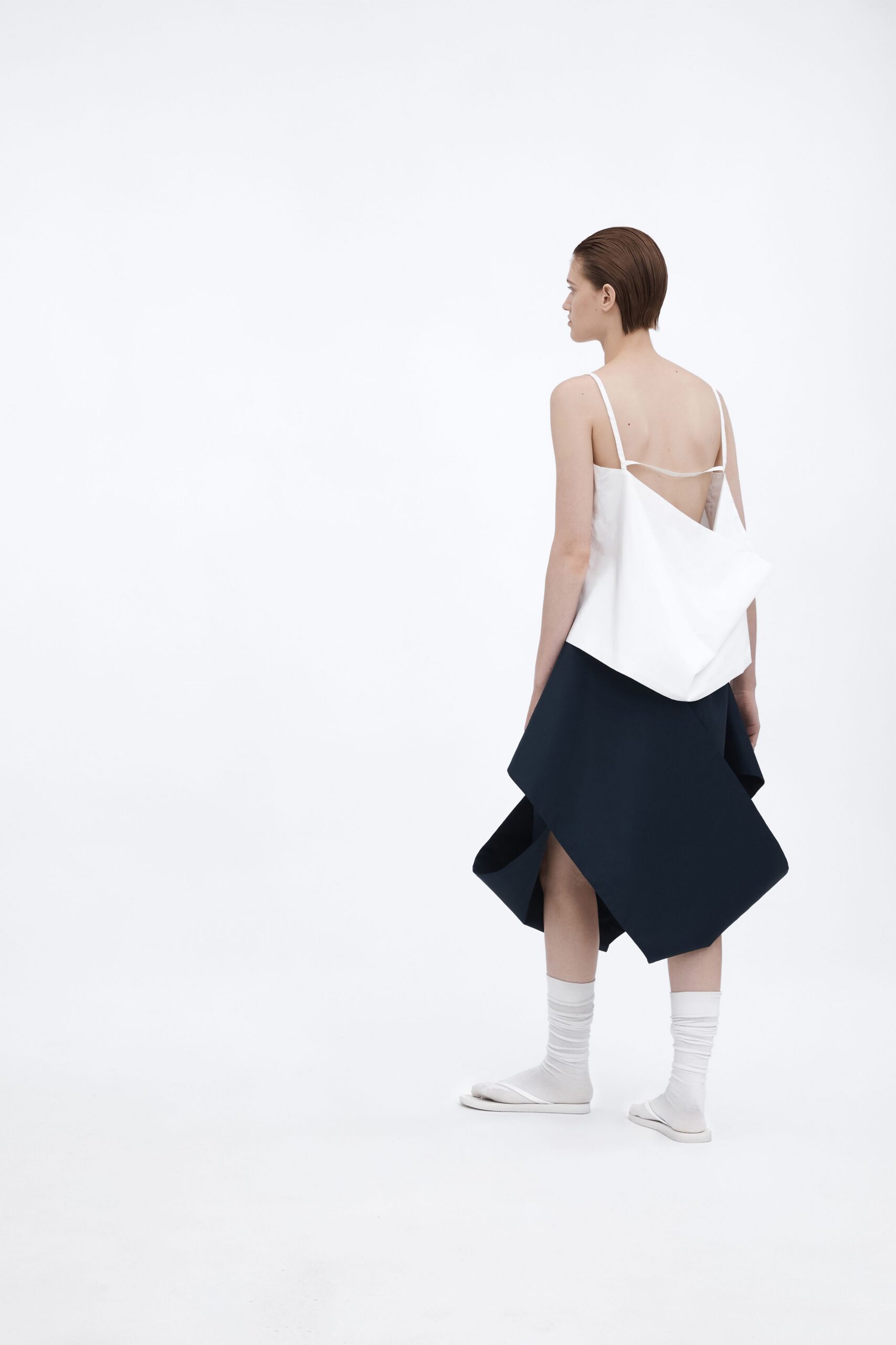white fitted top blue asymmetric skirt