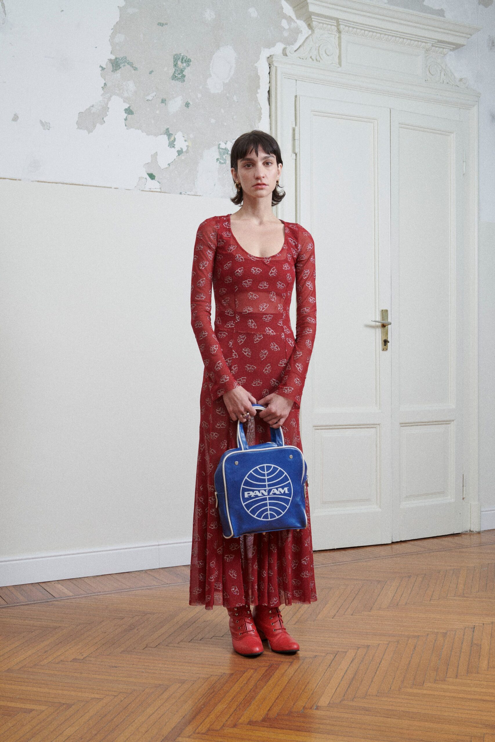 red maxi dress with blue bag