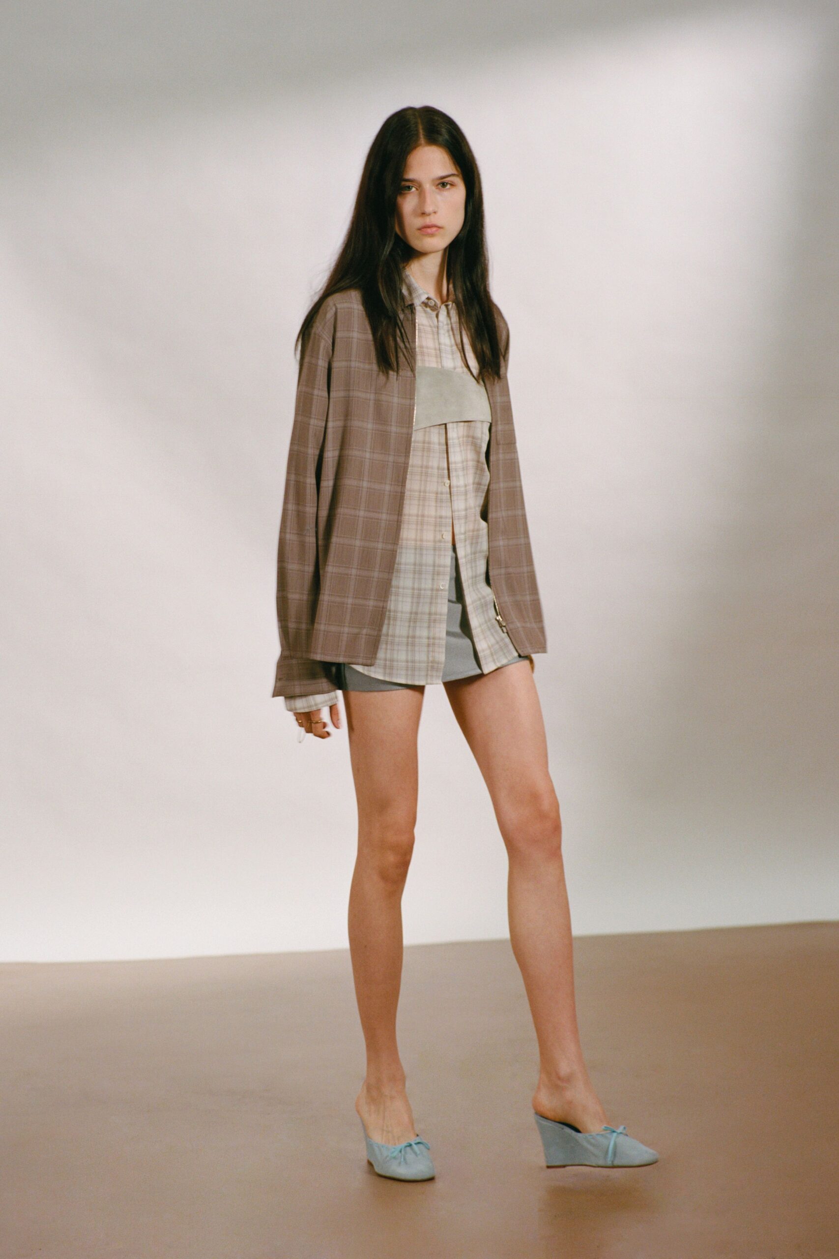 brown checked shirt with gray top and shorts