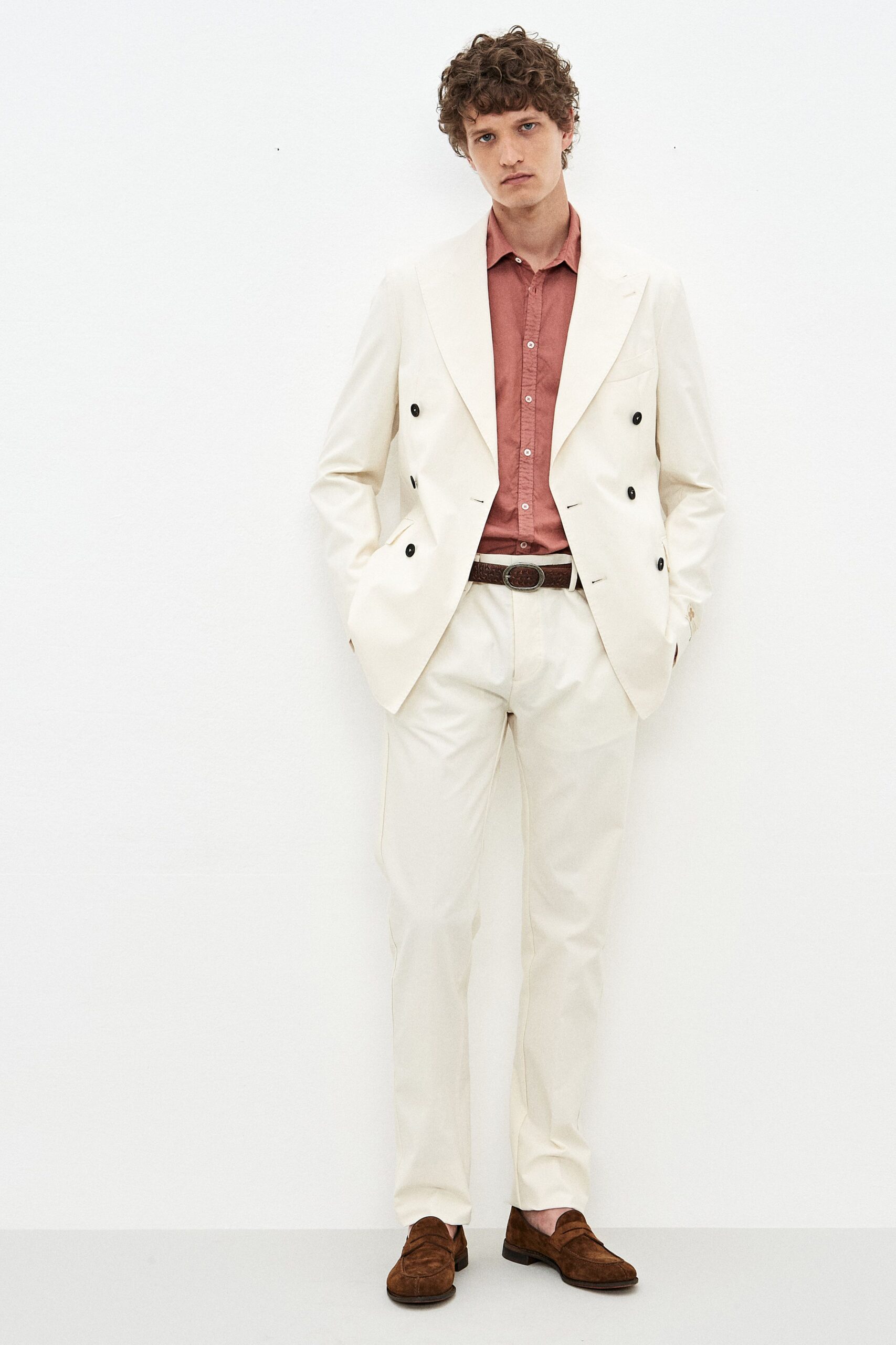 white tailored suit with red shirt