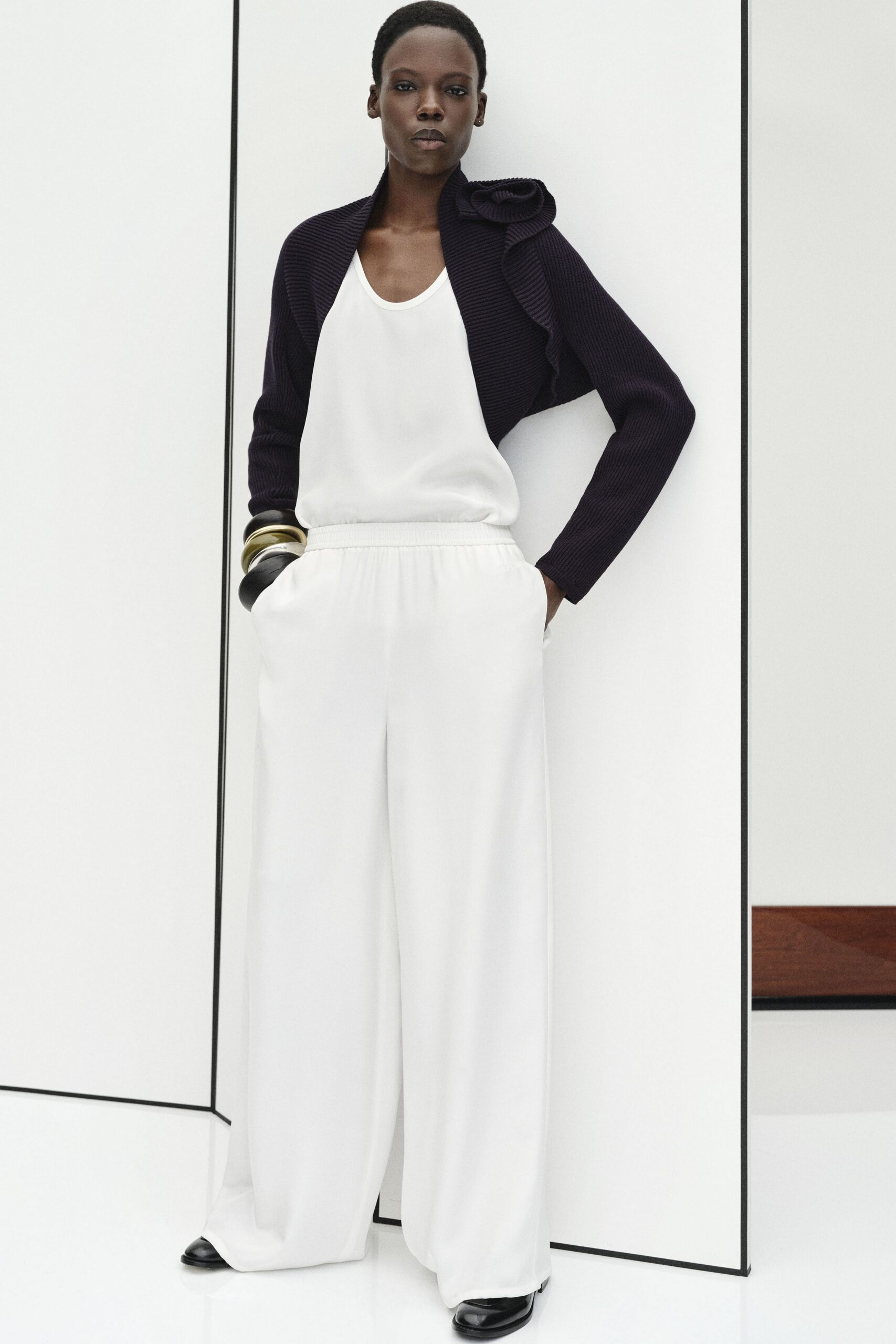 black cotton long-sleeve collared fitted ruffled jacket