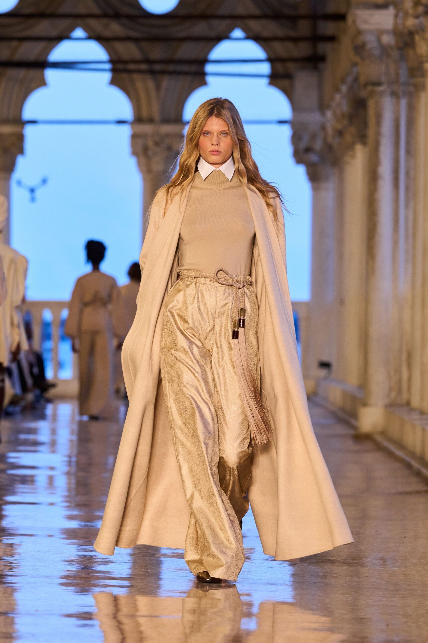 beige wool coat with gold pants