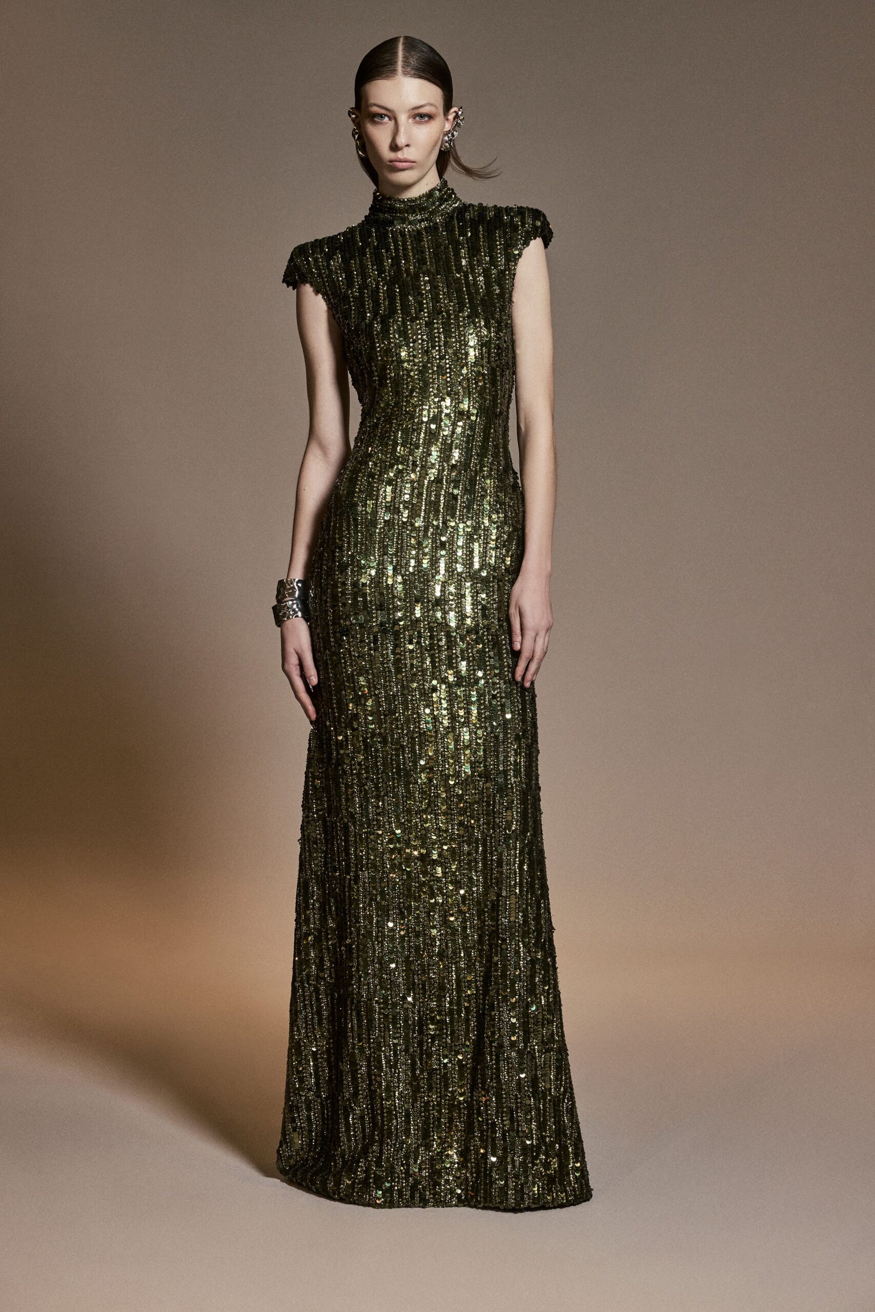 green sequined sleeveless gown