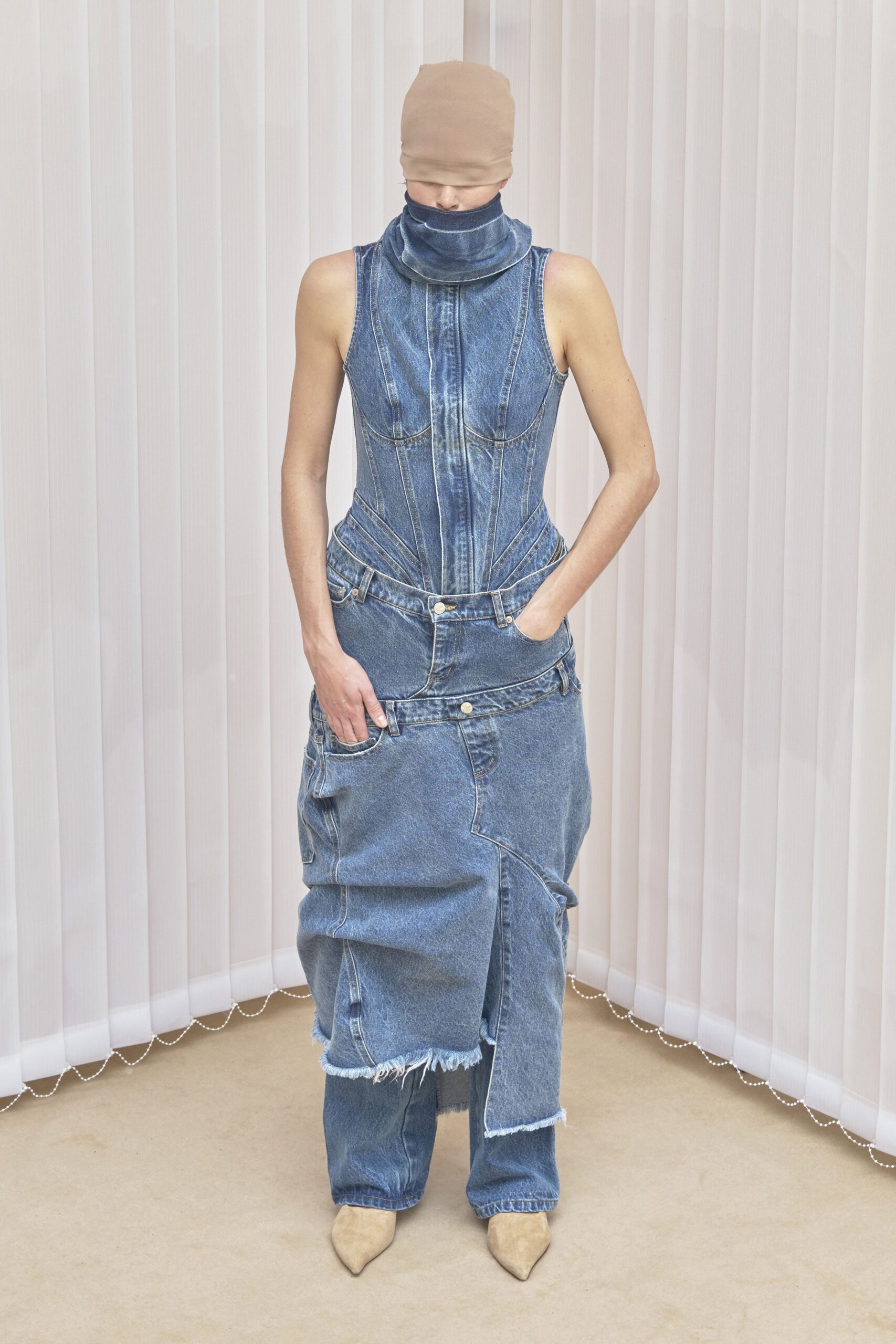 blue denim sleeveless high-neck fitted zippered distressed jumpsuit