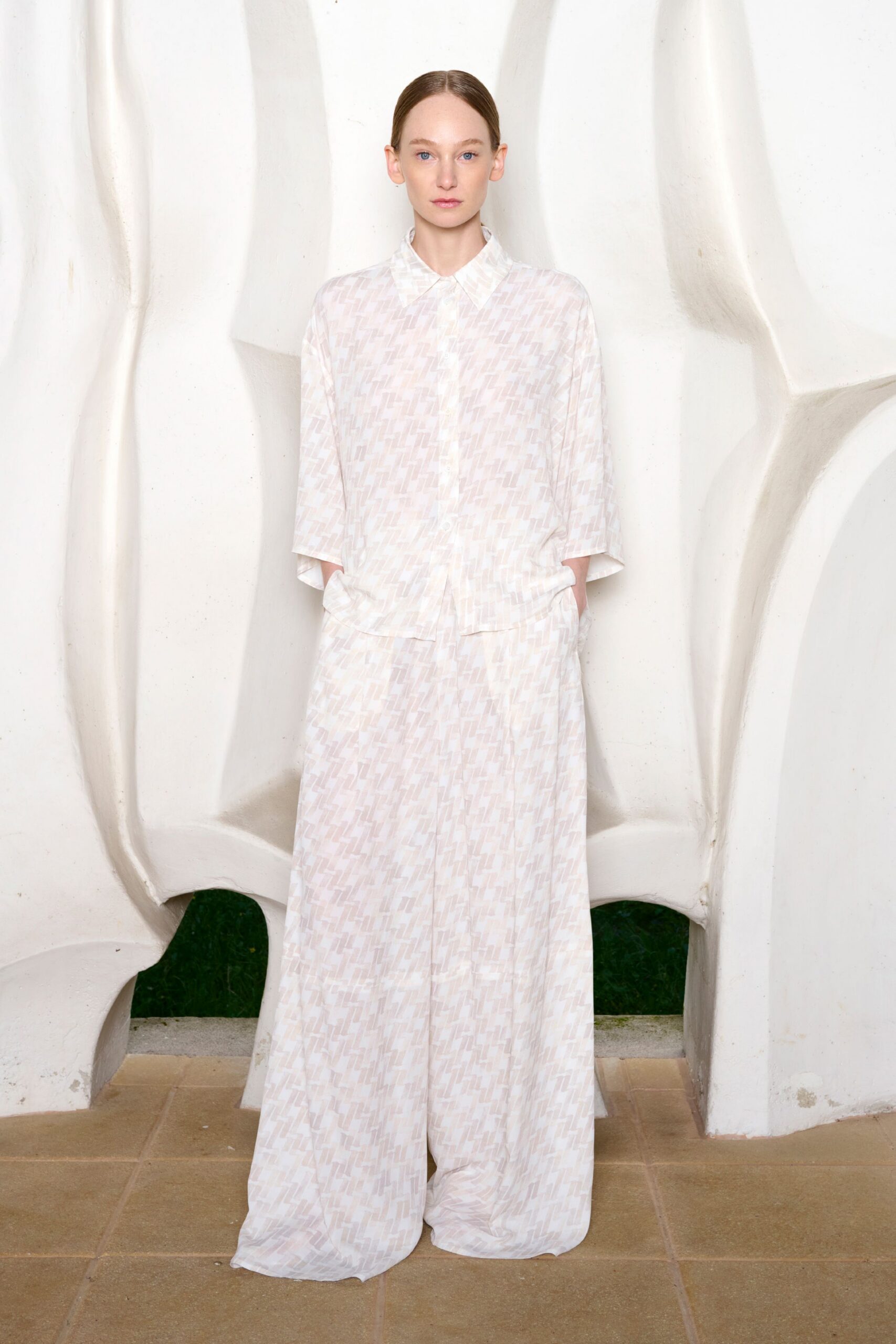 white relaxed shirt and pants