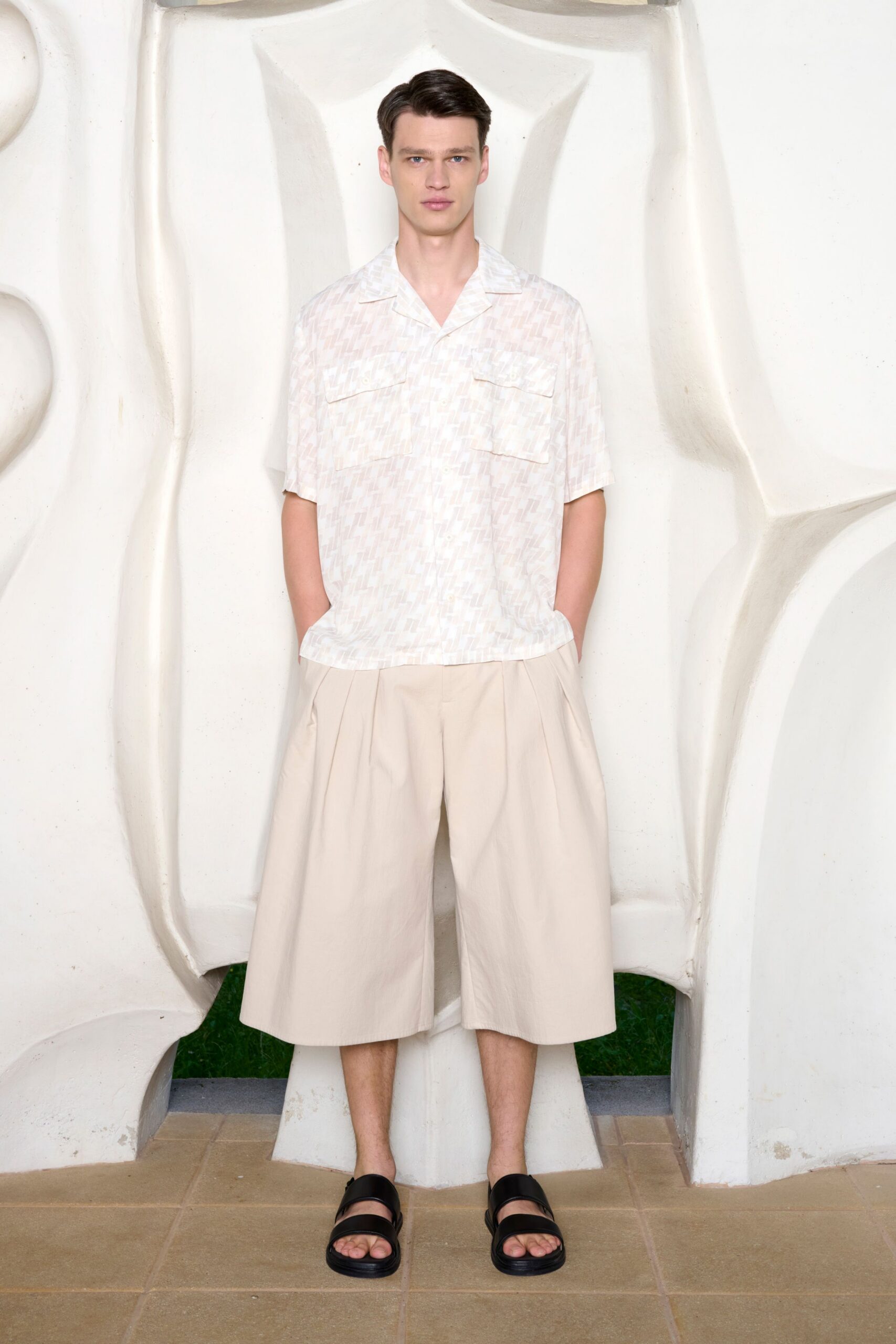 relaxed white shirt beige shorts