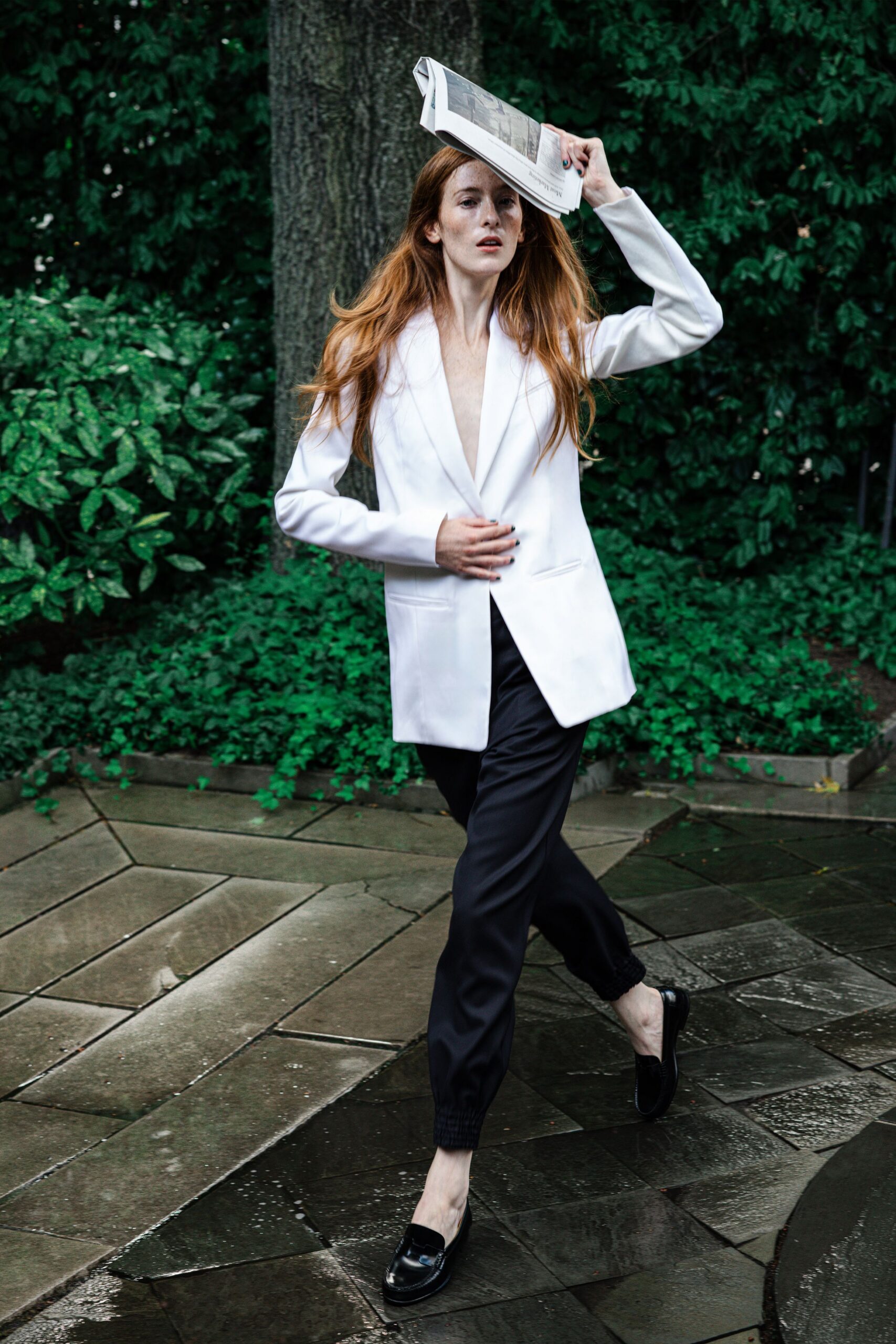 white tailored blazer black pants