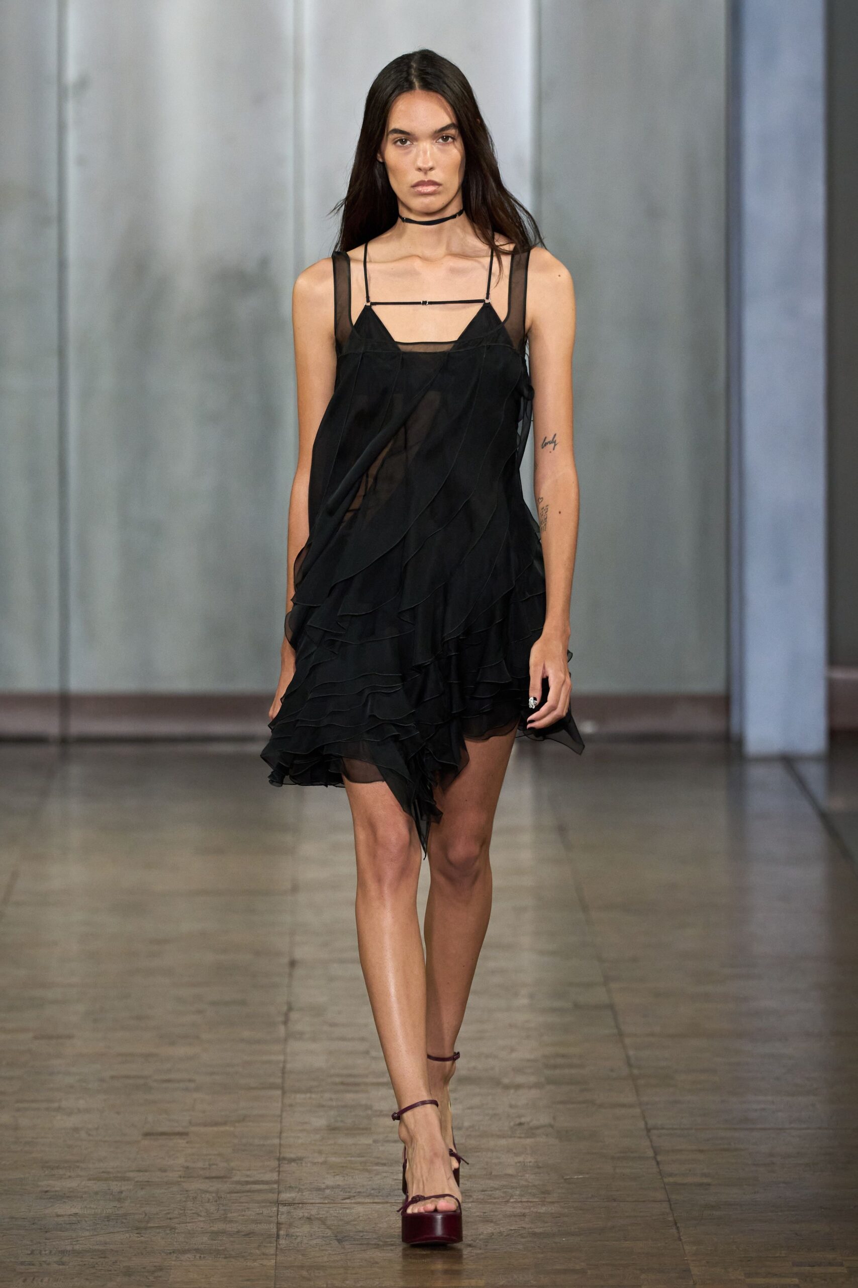 black silk sleeveless v-neck fitted ruffled flowing dress
