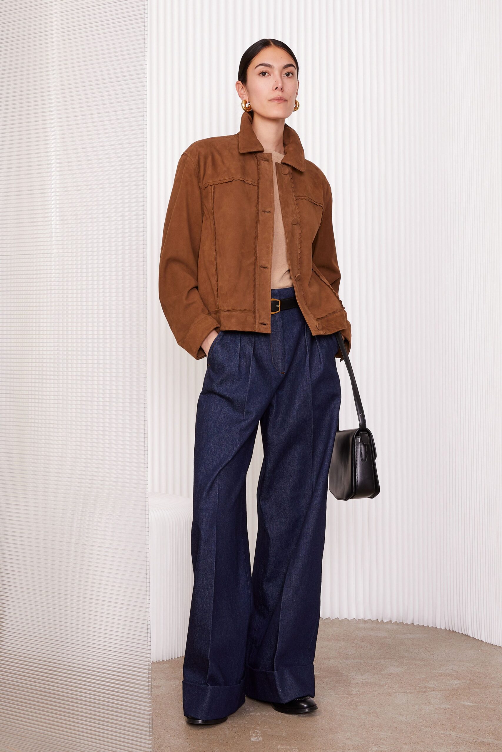 brown suede jacket with wide-leg pants