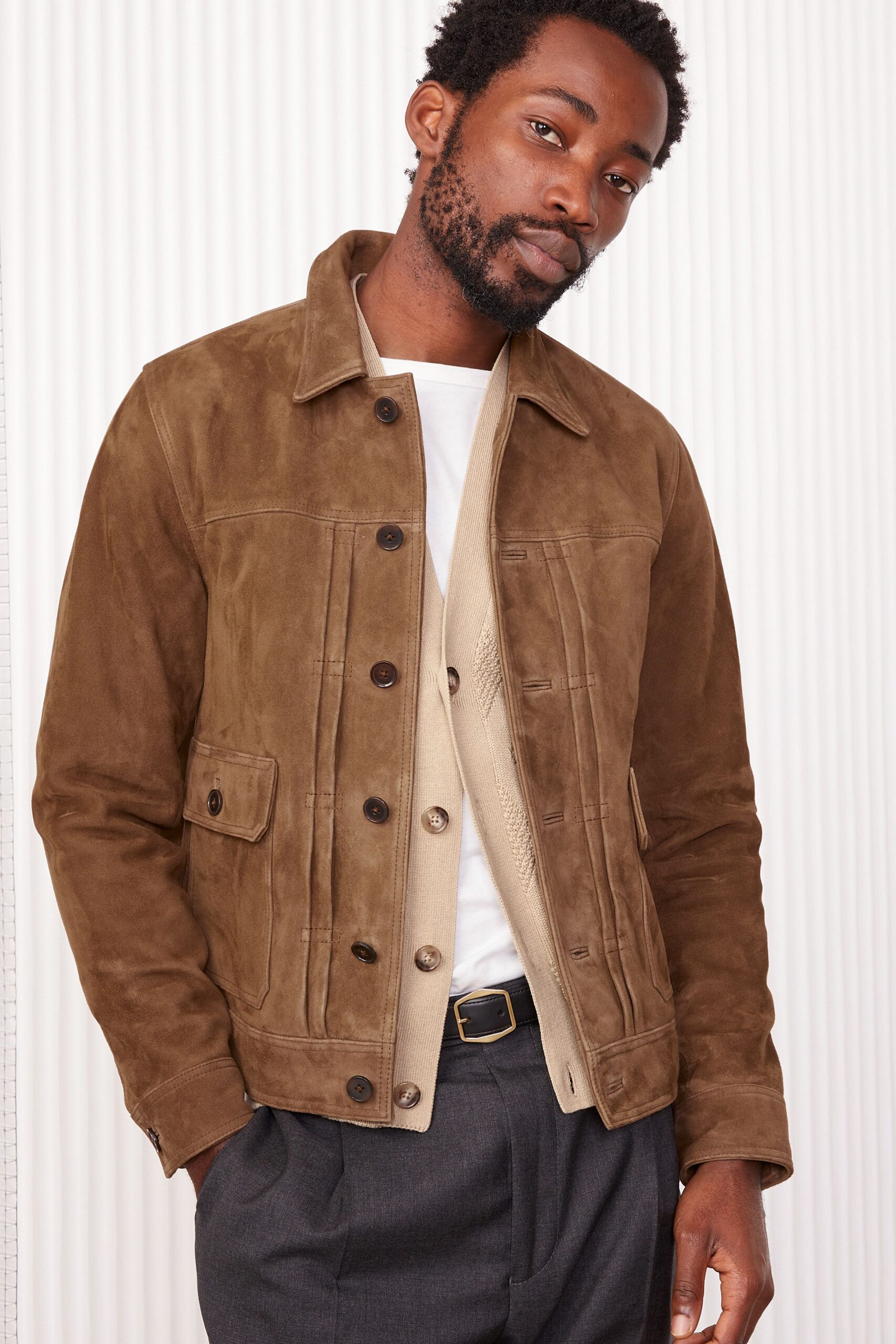 brown suede jacket with white shirt