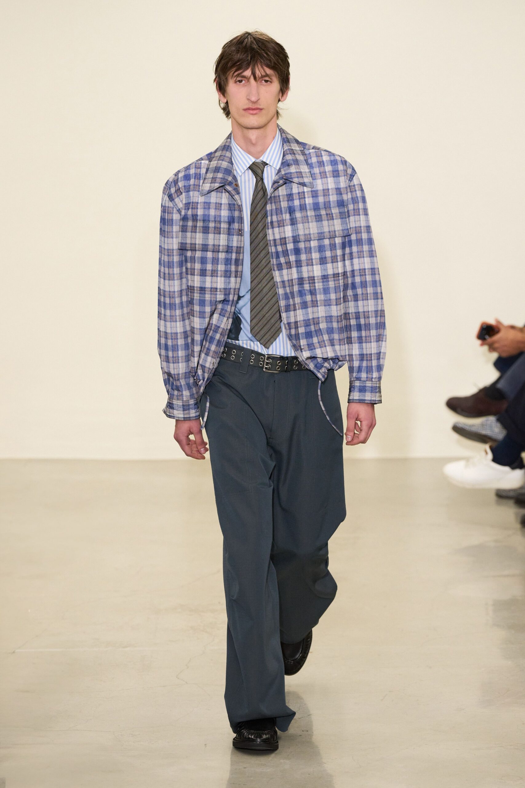 blue checked shirt with gray pants