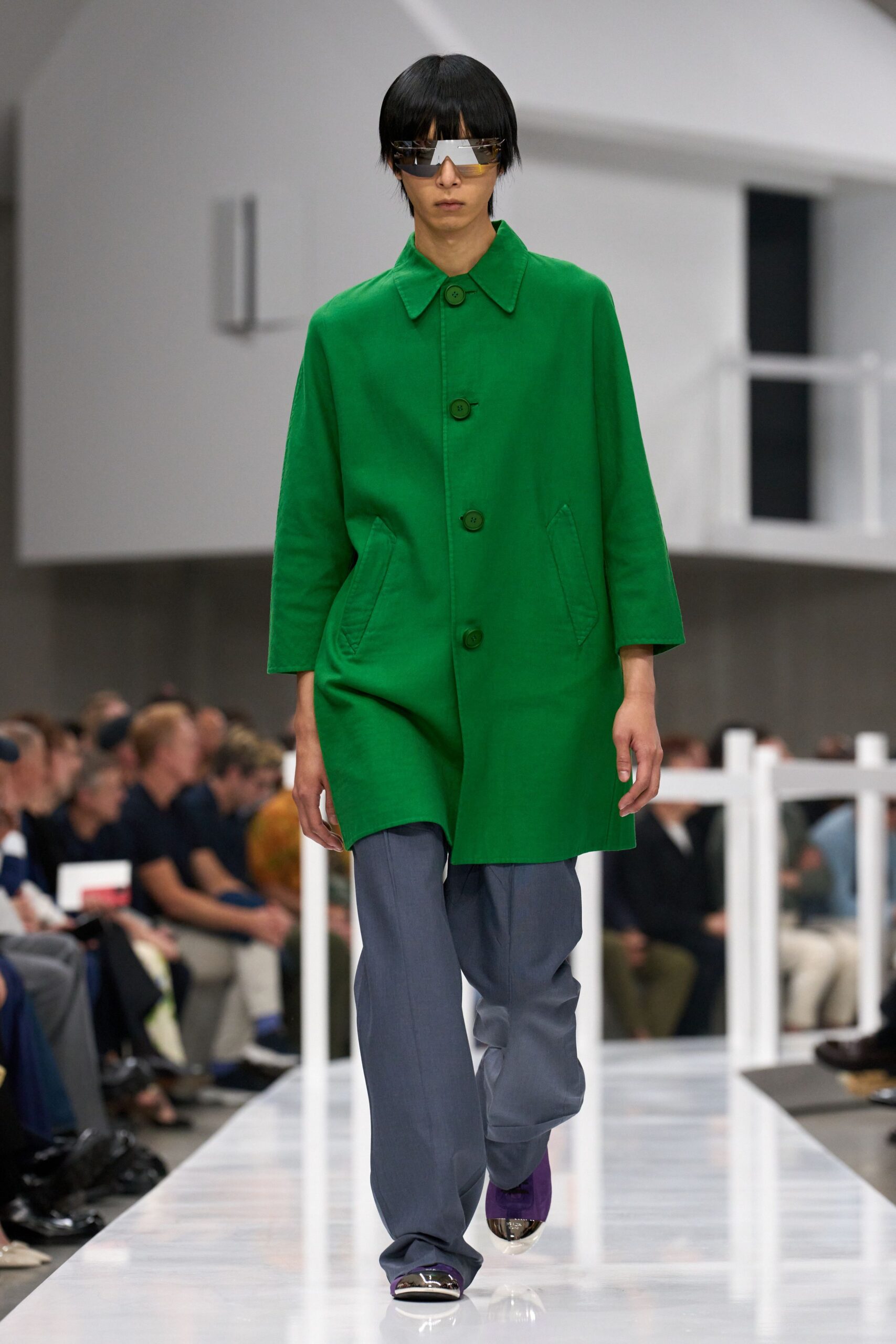 green coat gray pants purple shoes