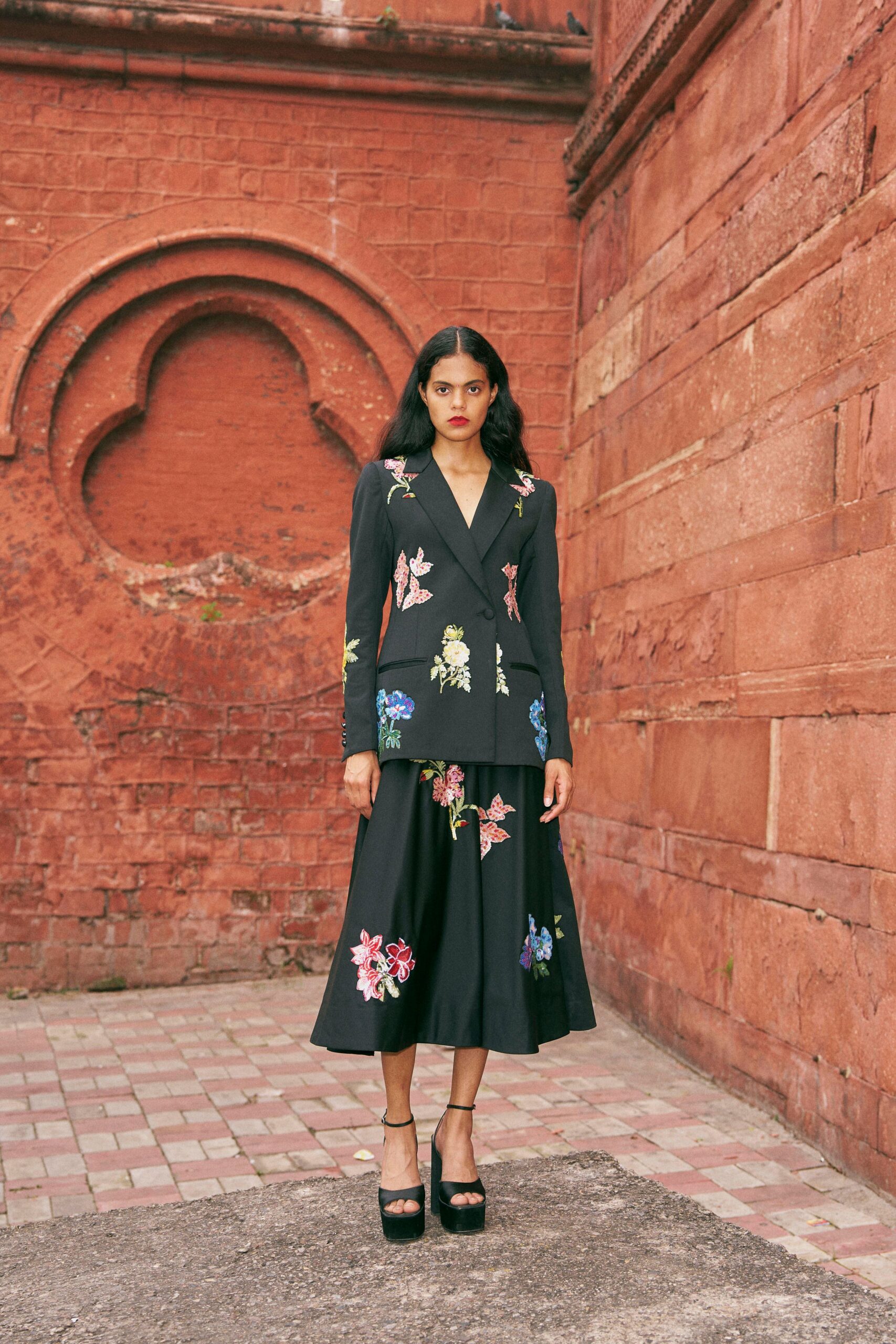 black cotton fitted flared midi skirt