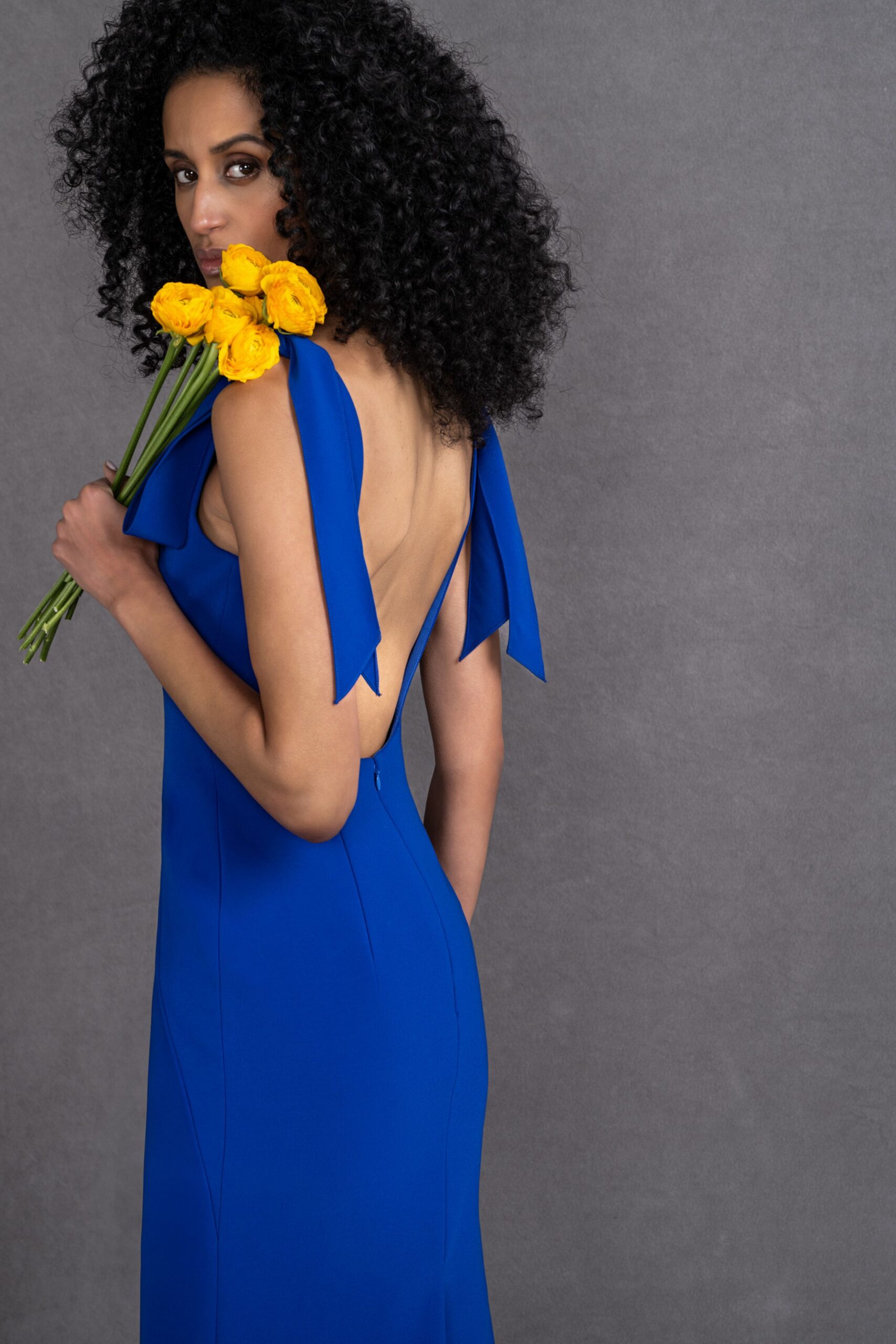 blue fitted backless gown