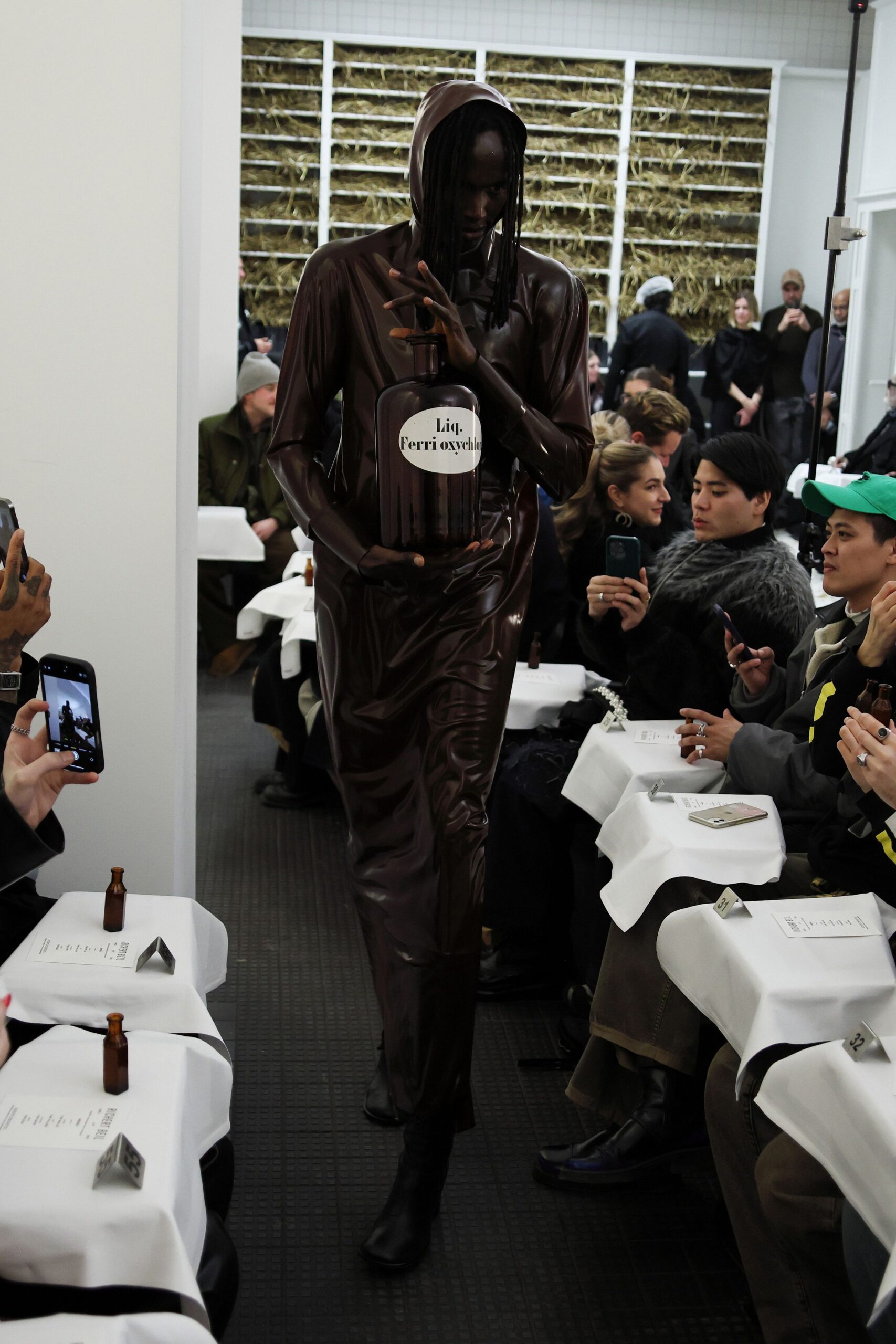 brown vinyl long-sleeve hooded fitted shiny jumpsuit