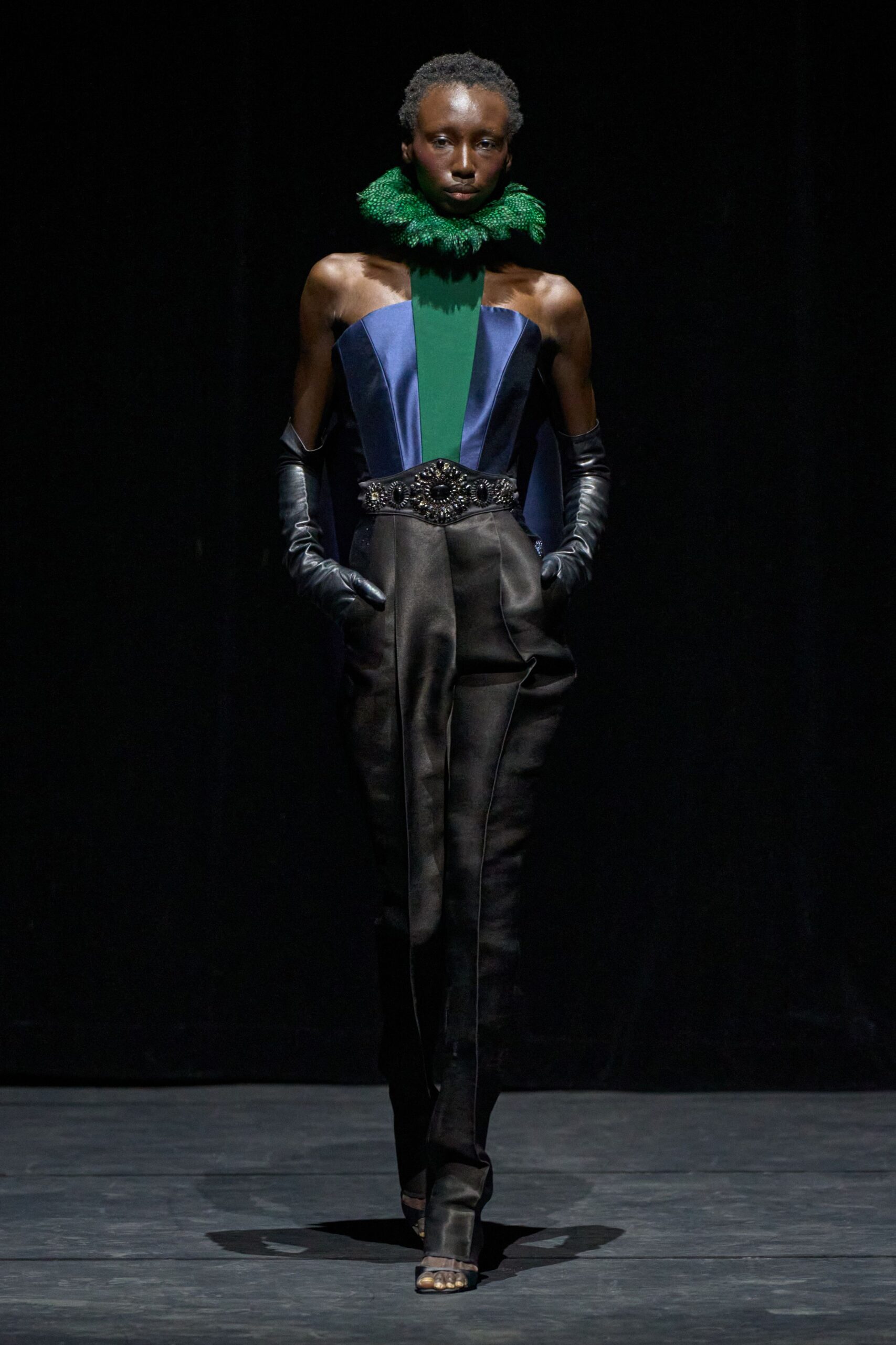 blue silk sleeveless high-neck fitted zippered belted jumpsuit