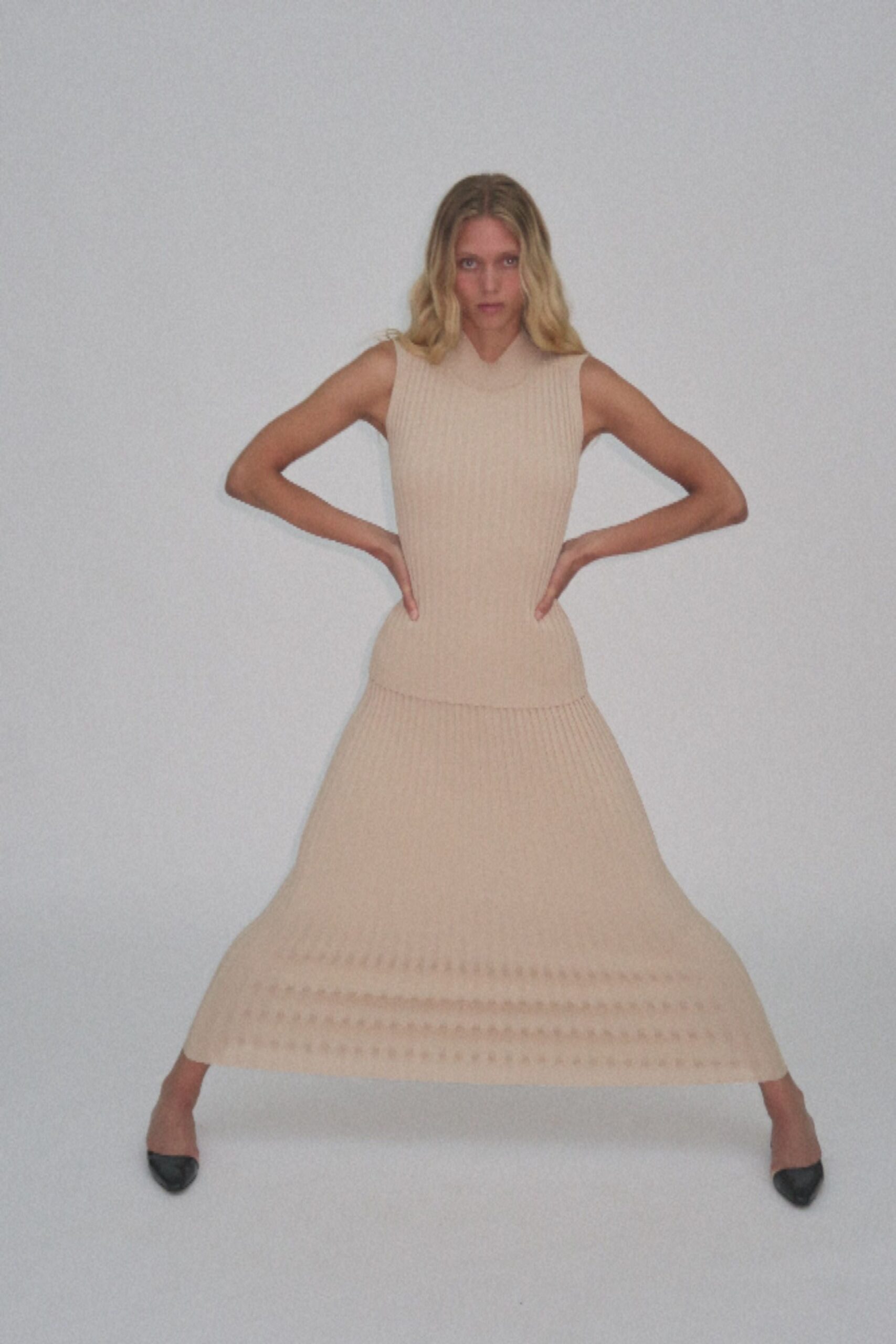 beige knit sleeveless v-neck fitted ribbed midi dress