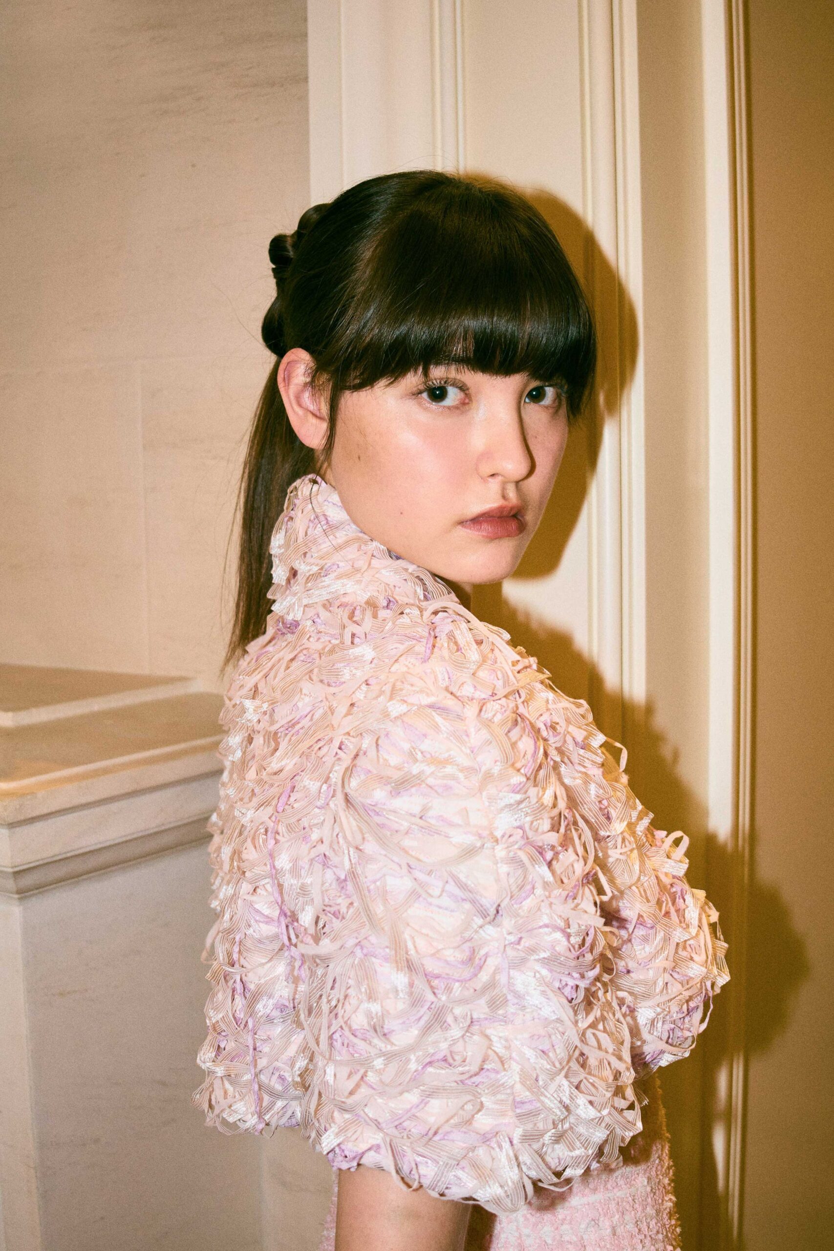 pink ruffled silk blouse