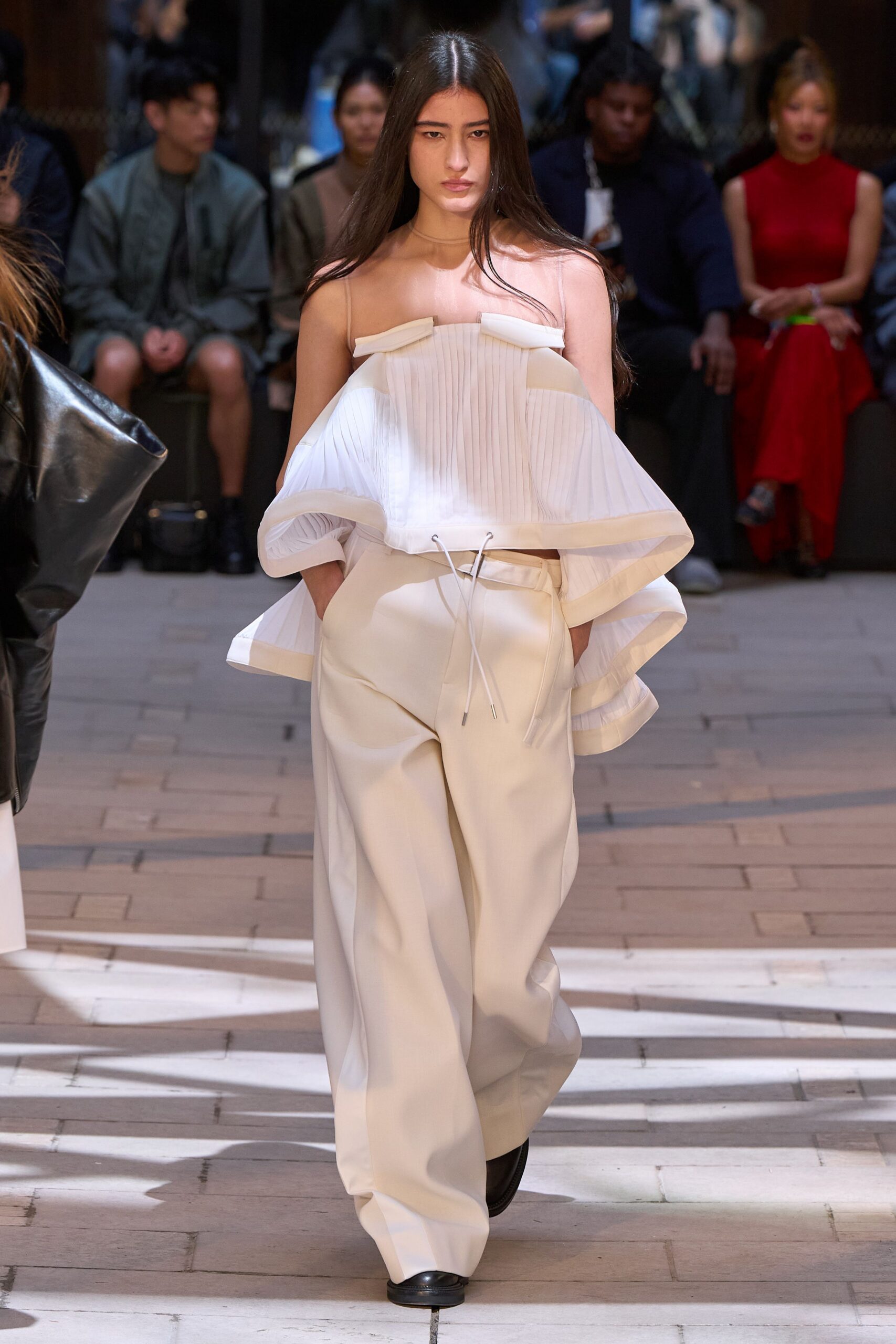 white pleated top and pants