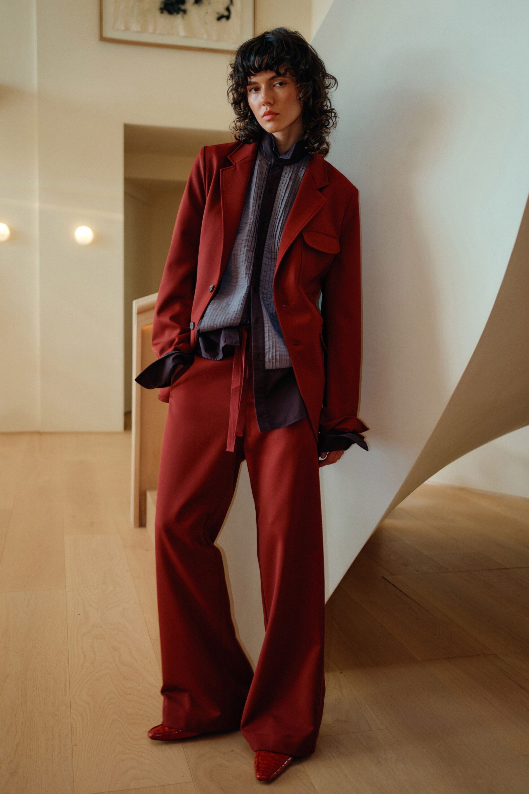 red long-sleeve collared tailored blazer