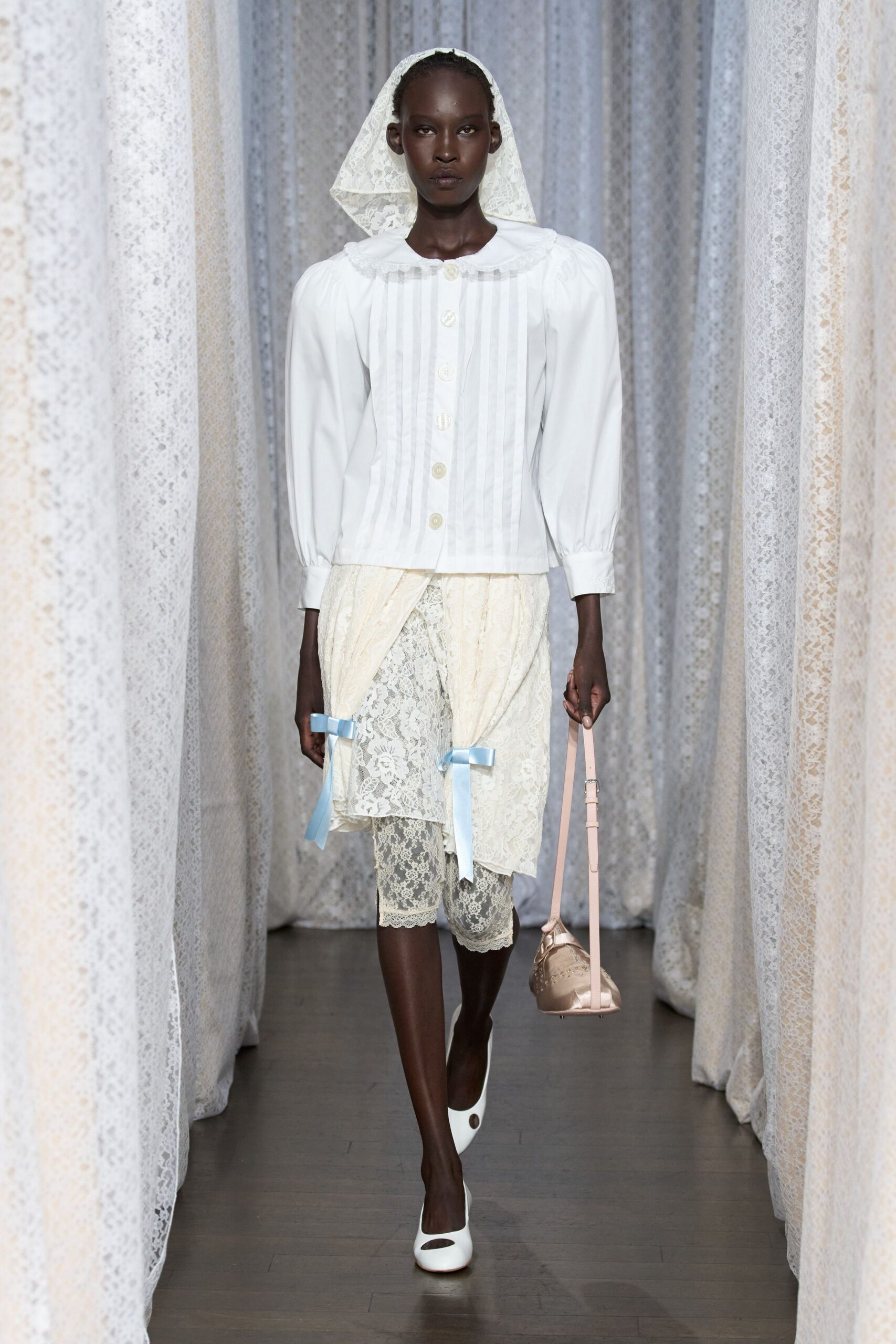 white cotton long-sleeve collared fitted buttoned pleated blouse