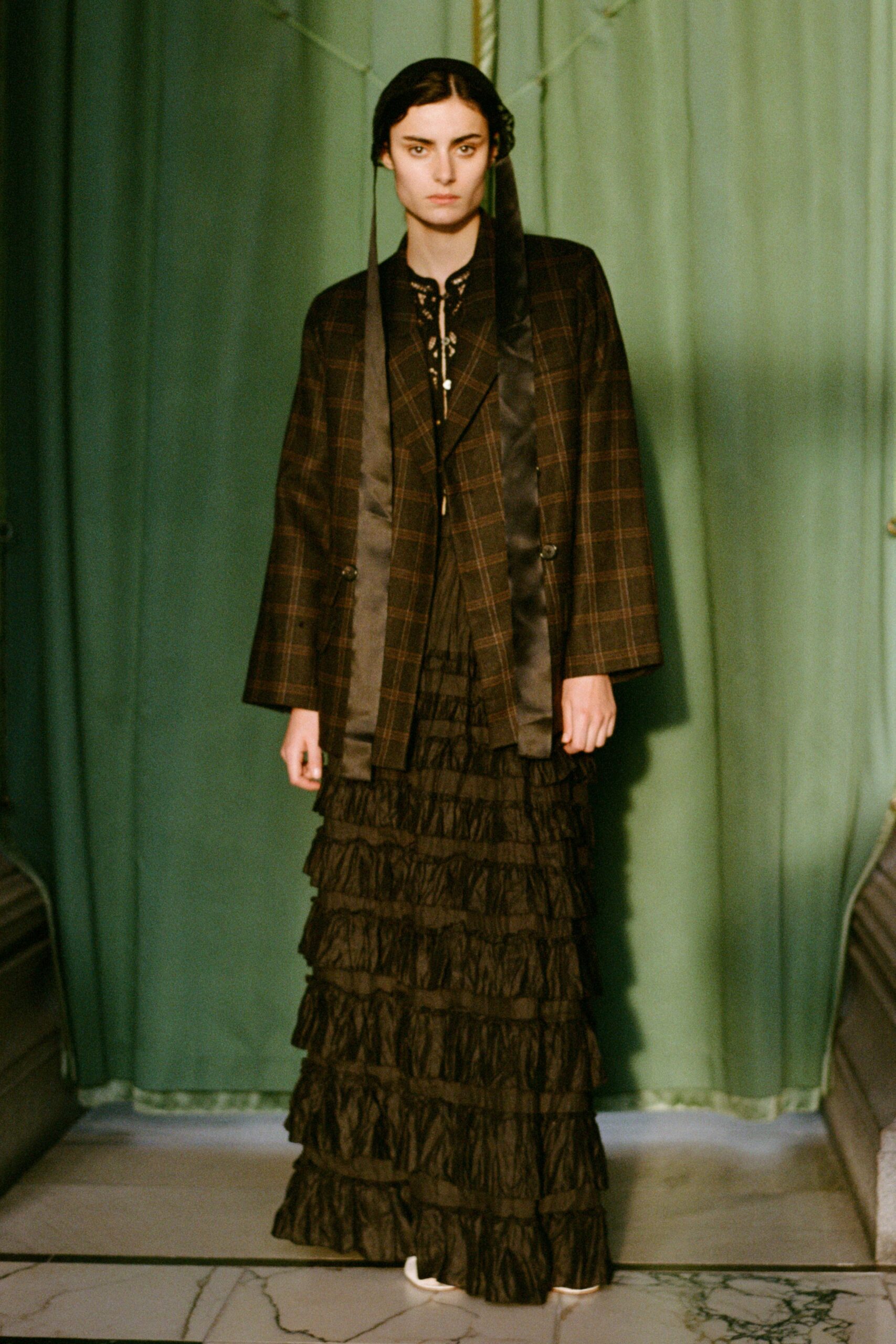 black tiered ruffled skirt with coat