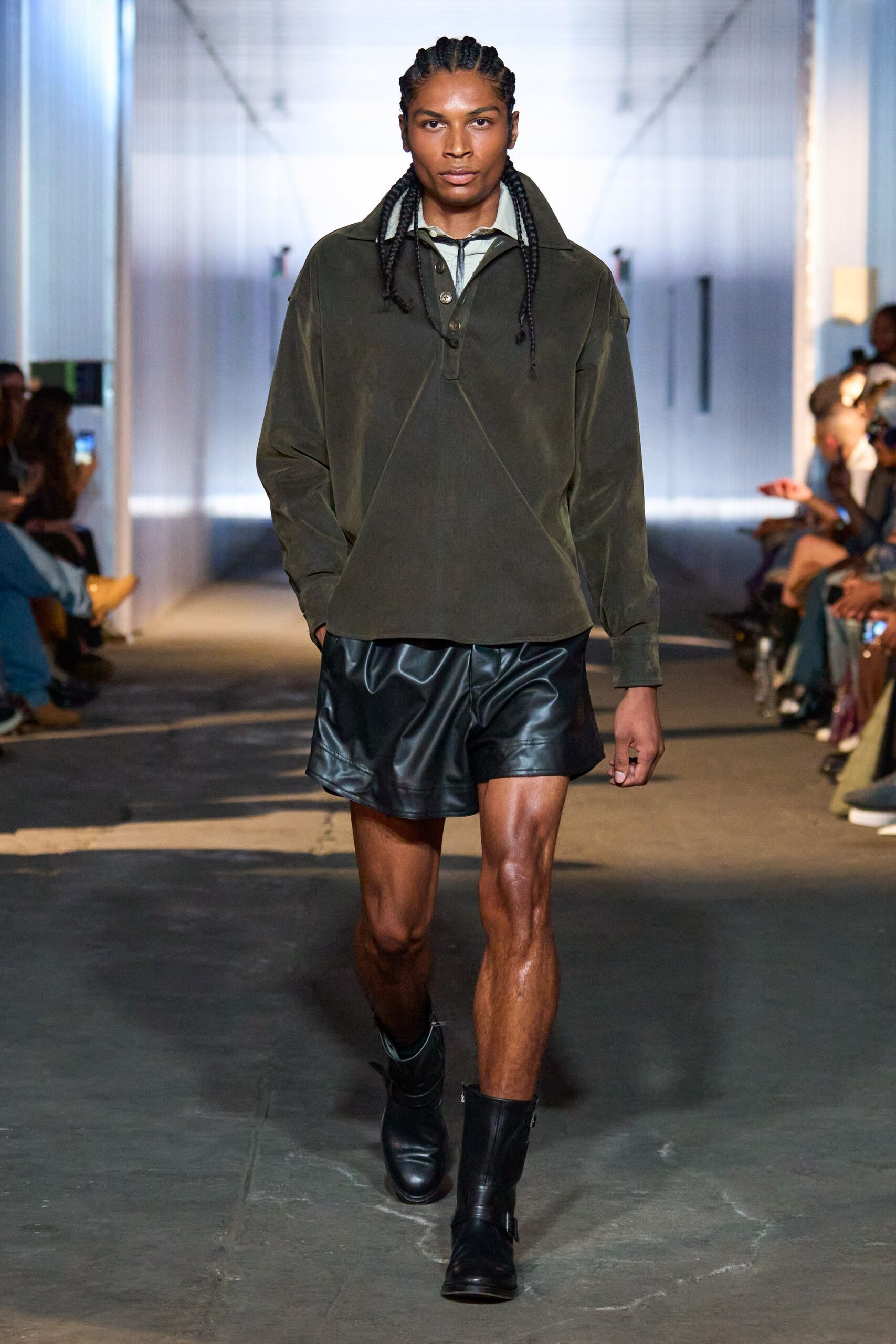 green relaxed shirt with black leather shorts