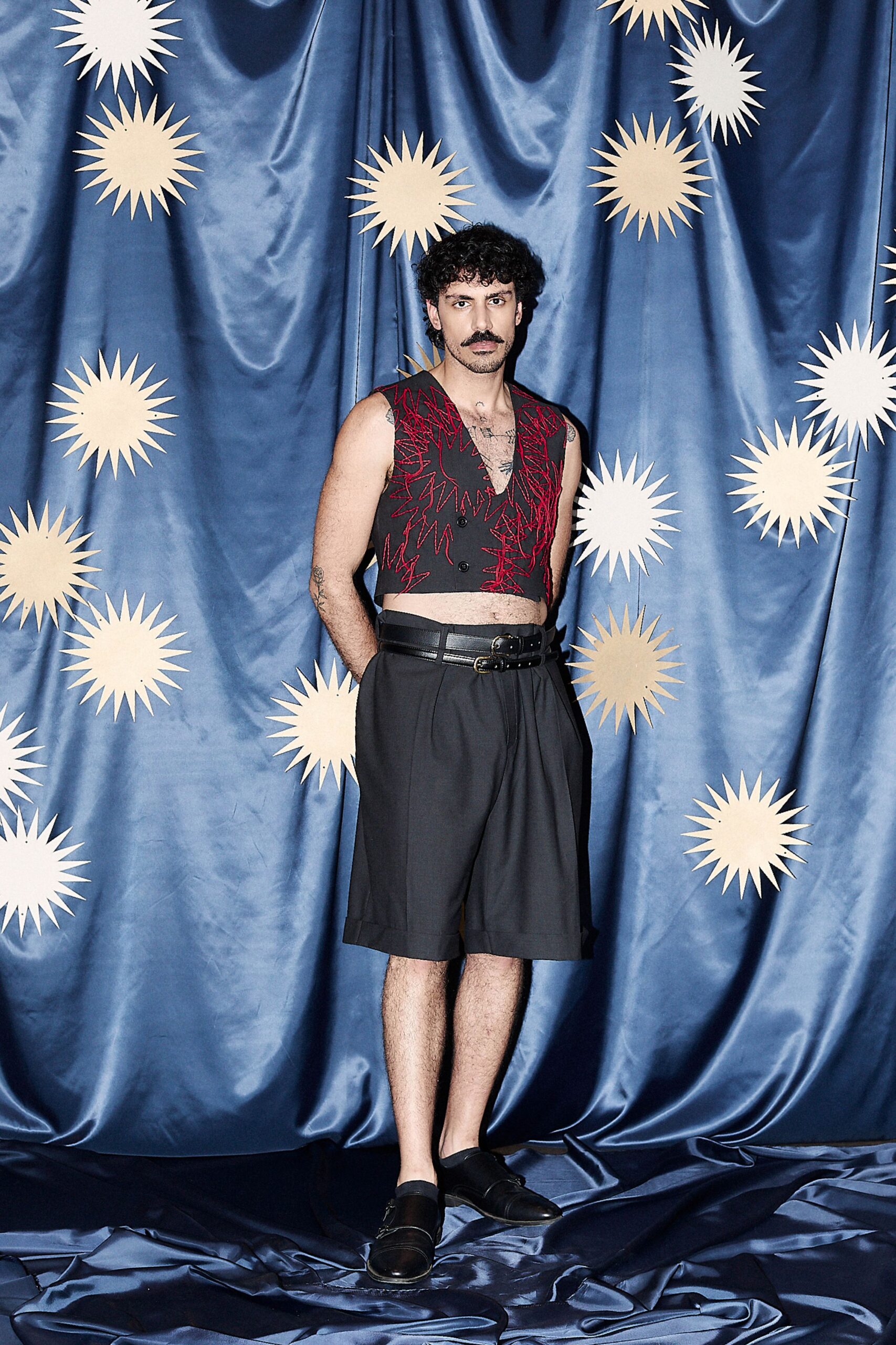 black fitted vest and shorts