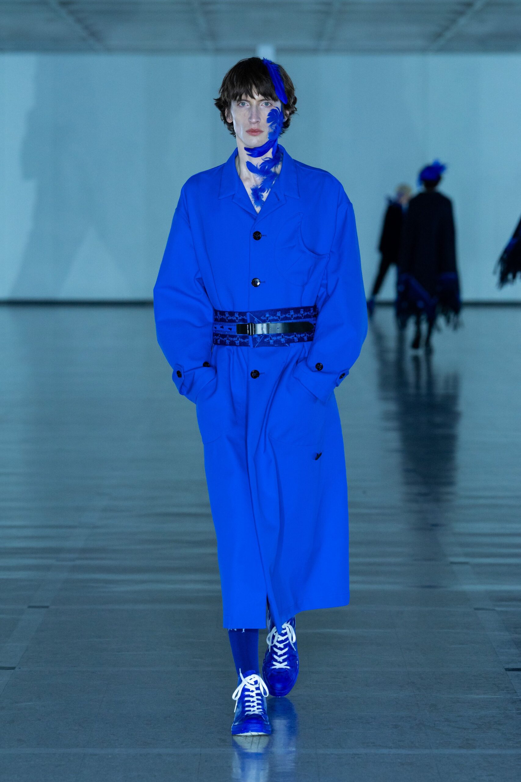 blue oversized coat with relaxed pants