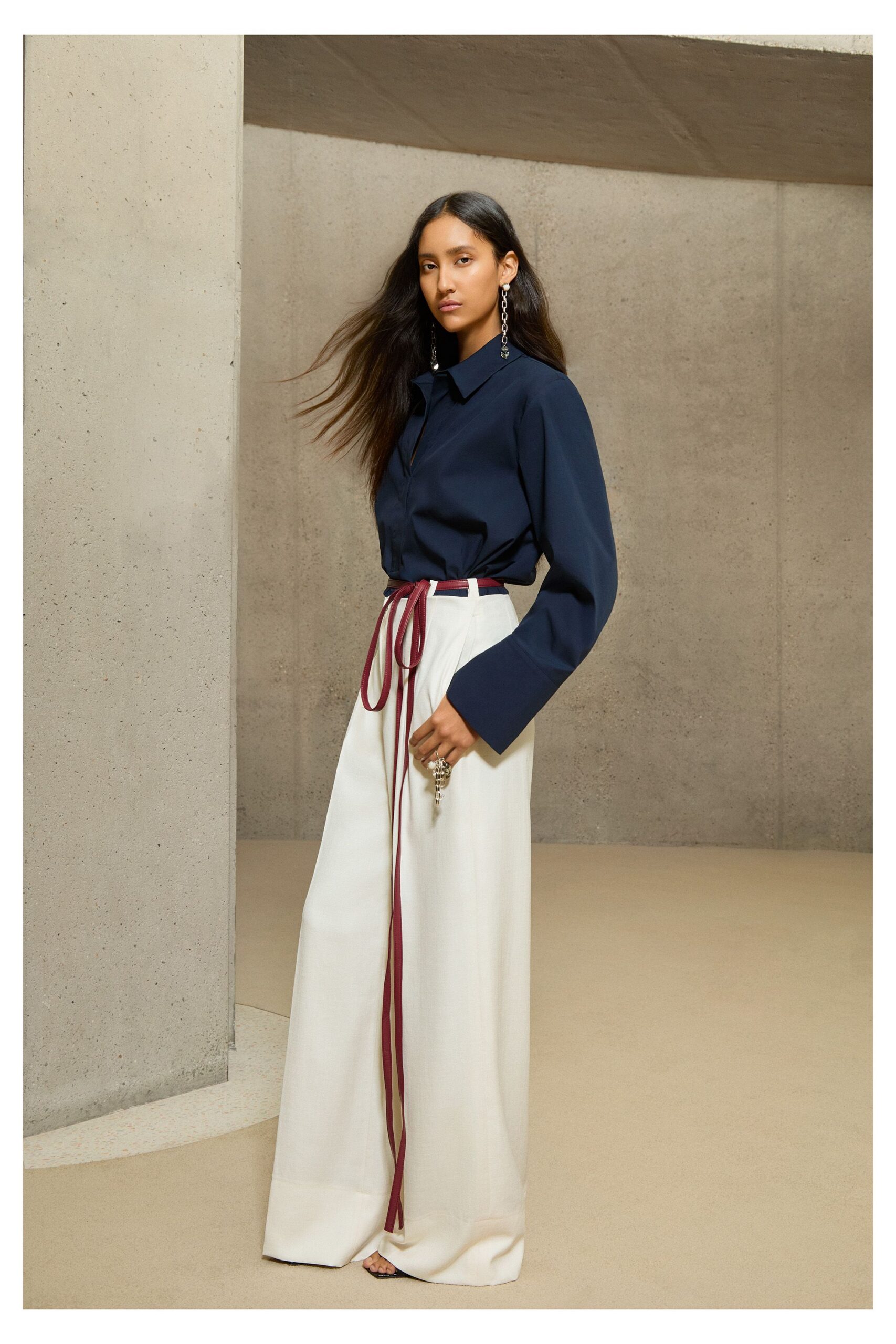 navy shirt white wide-leg pants