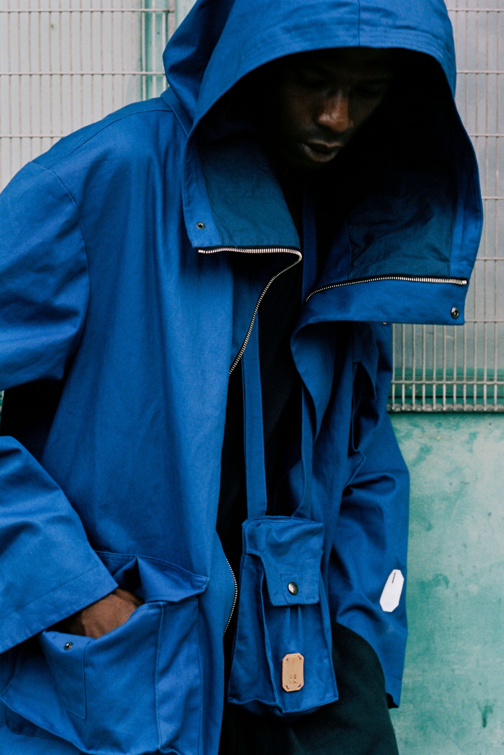 blue relaxed hooded jacket with bag