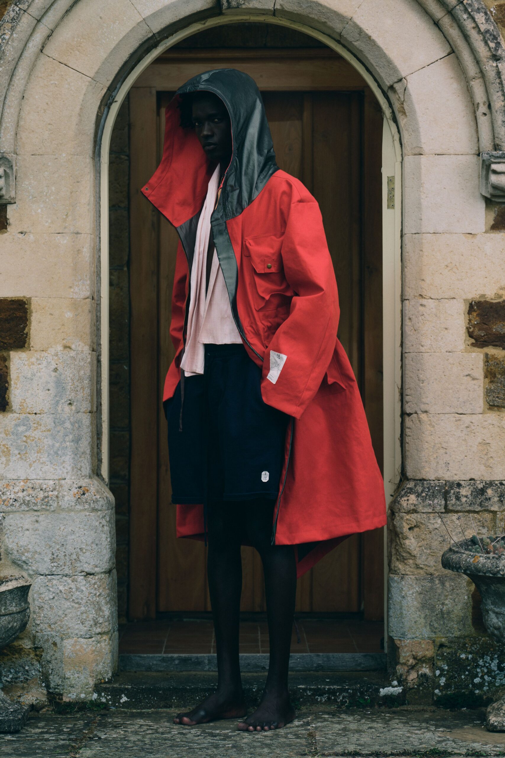 red cotton long-sleeve hooded oversized coat