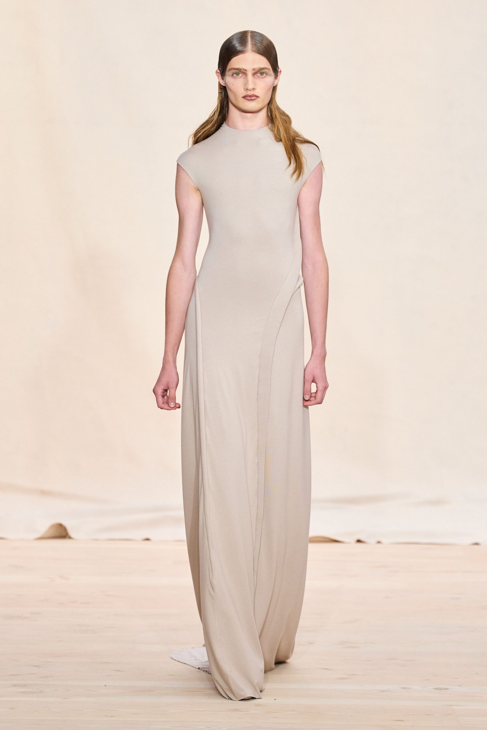 beige fitted sleeveless gown