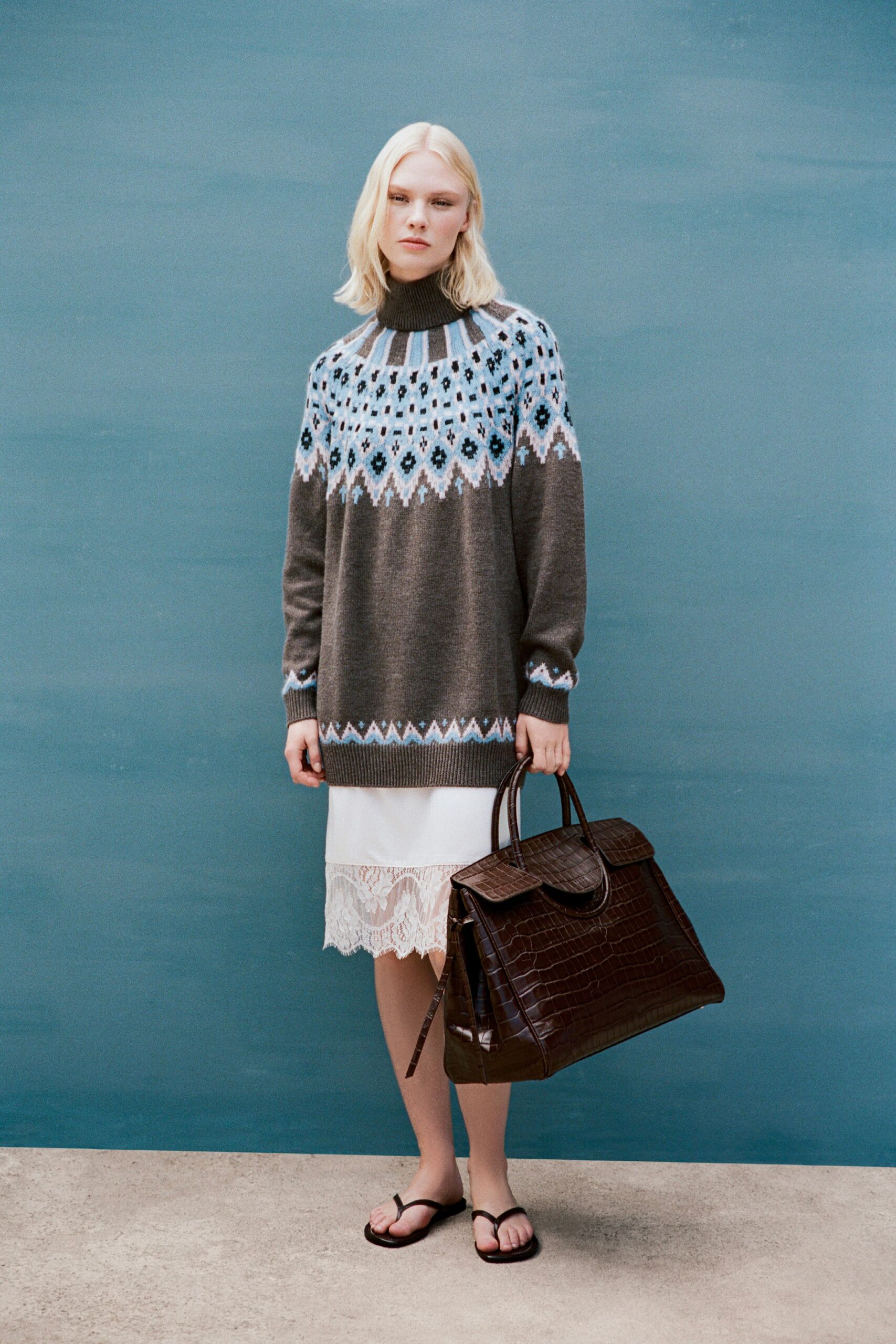 gray wool long-sleeve turtleneck relaxed embroidered sweater